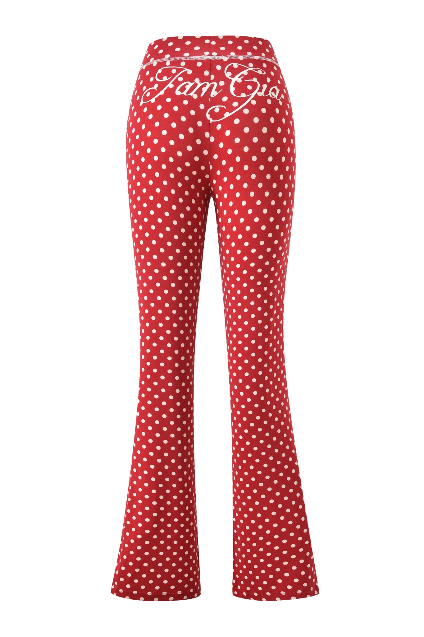 The BLARE TRACKPANT - RED POLKA DOT by I.AM.GIA features a red high-waisted design with white polka dots and "I.AM.GIA" in white script on the back waistband.