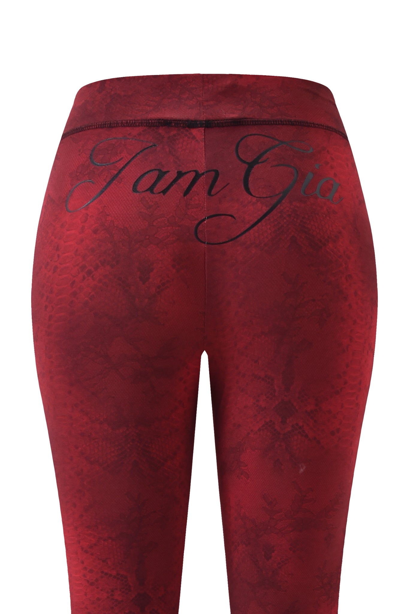 Back view of BLARE TRACKPANT - RED SERPENTINE by I.AM.GIA, featuring a red serpentine print and "I.AM.GIA" in black script on the waistband.