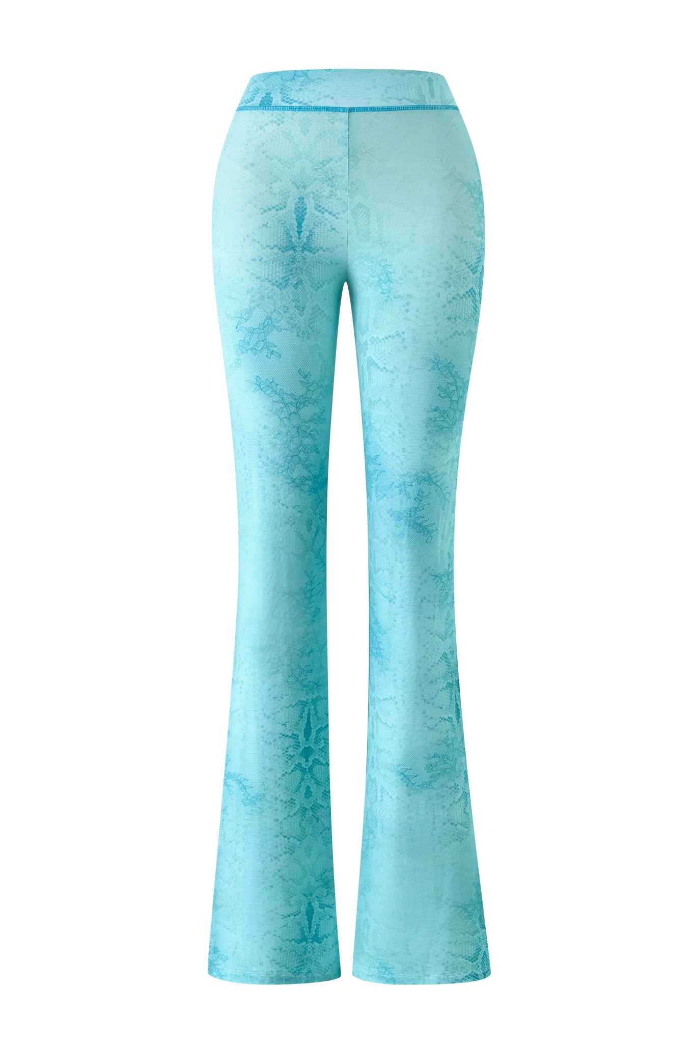 A pair of high-waisted BLARE TRACKPANT - TEAL SERPENTINE by I.AM.GIA, featuring a subtle snakeskin pattern and flared legs, shown from the back against a white background.