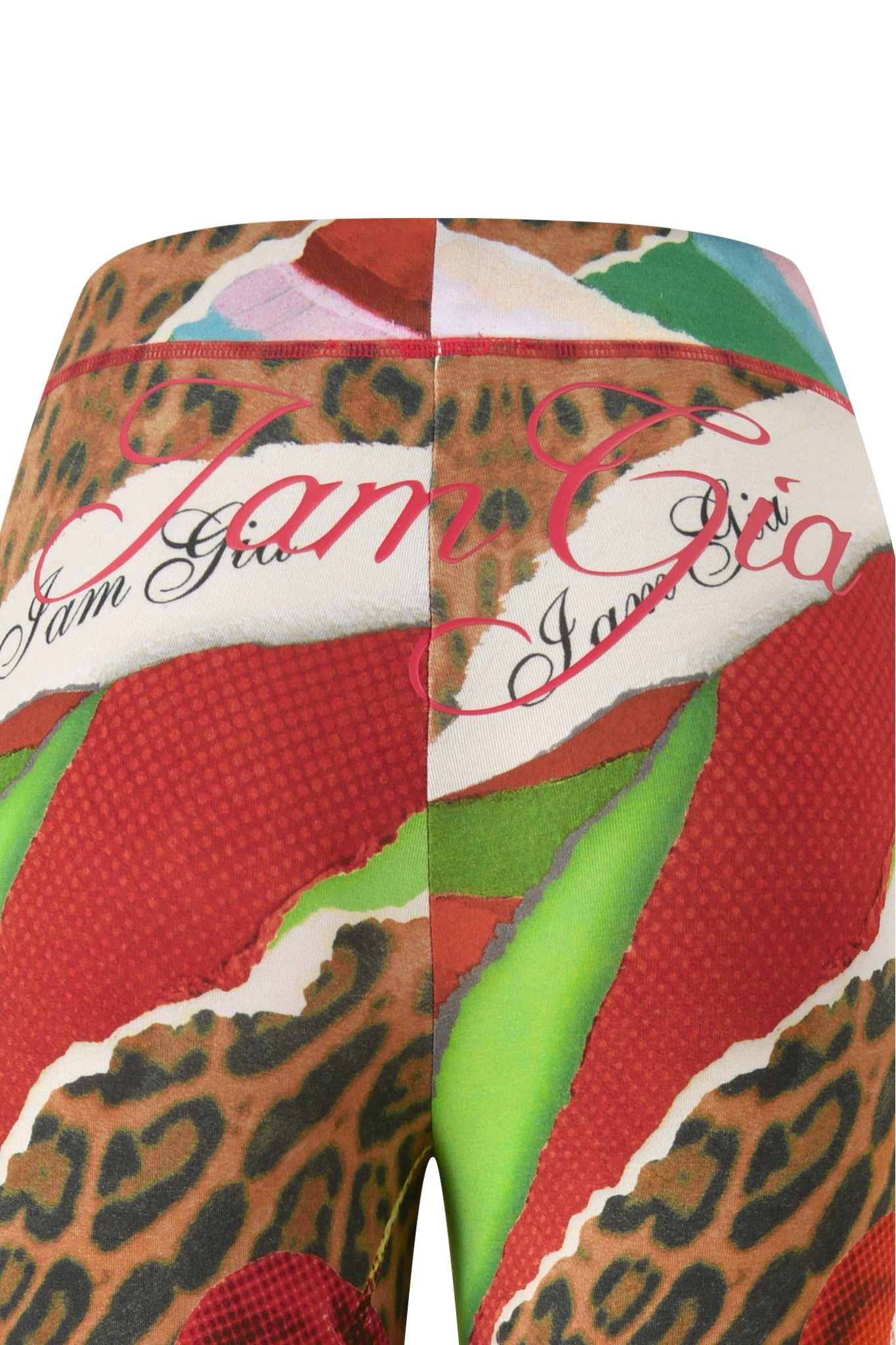 The BLARE TRACKPANT - WILD CHERRY by I.AM.GIA features animal print, red, green, and white abstract designs with Wild Cherry accents and repeated "Jam Gia" text on bamboo fabric.