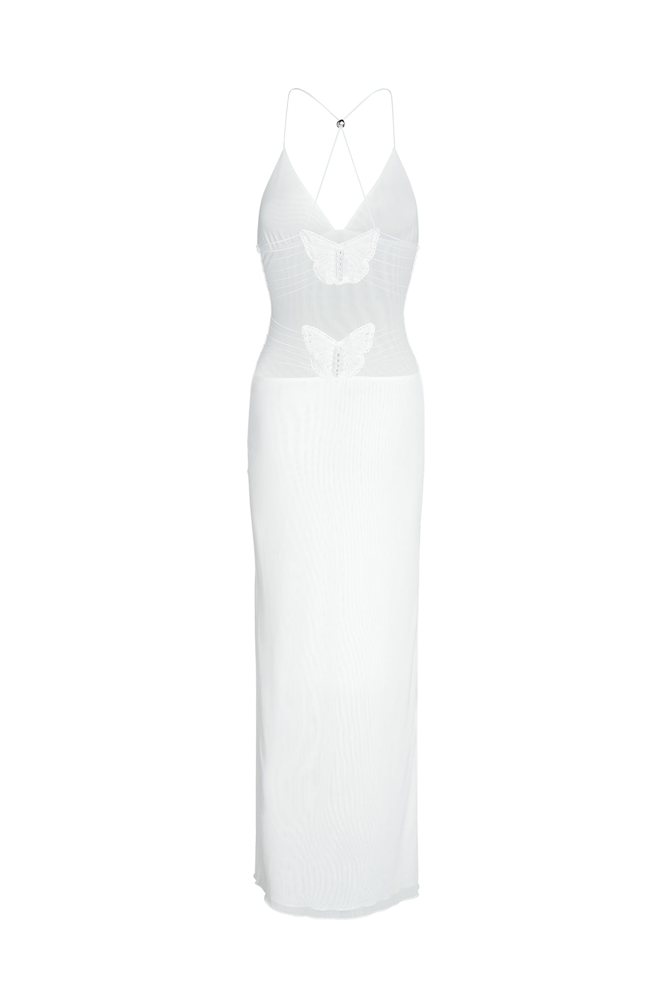 The ELLERY DRESS - WHITE from I.AM.GIA is a sleeveless garment featuring a crisscross strap design at the back. The dress boasts a fitted silhouette adorned with two butterfly appliqués—one situated at the waist and the other at the chest. The fabric is slightly sheer and extends into a long, floor-length hemline.