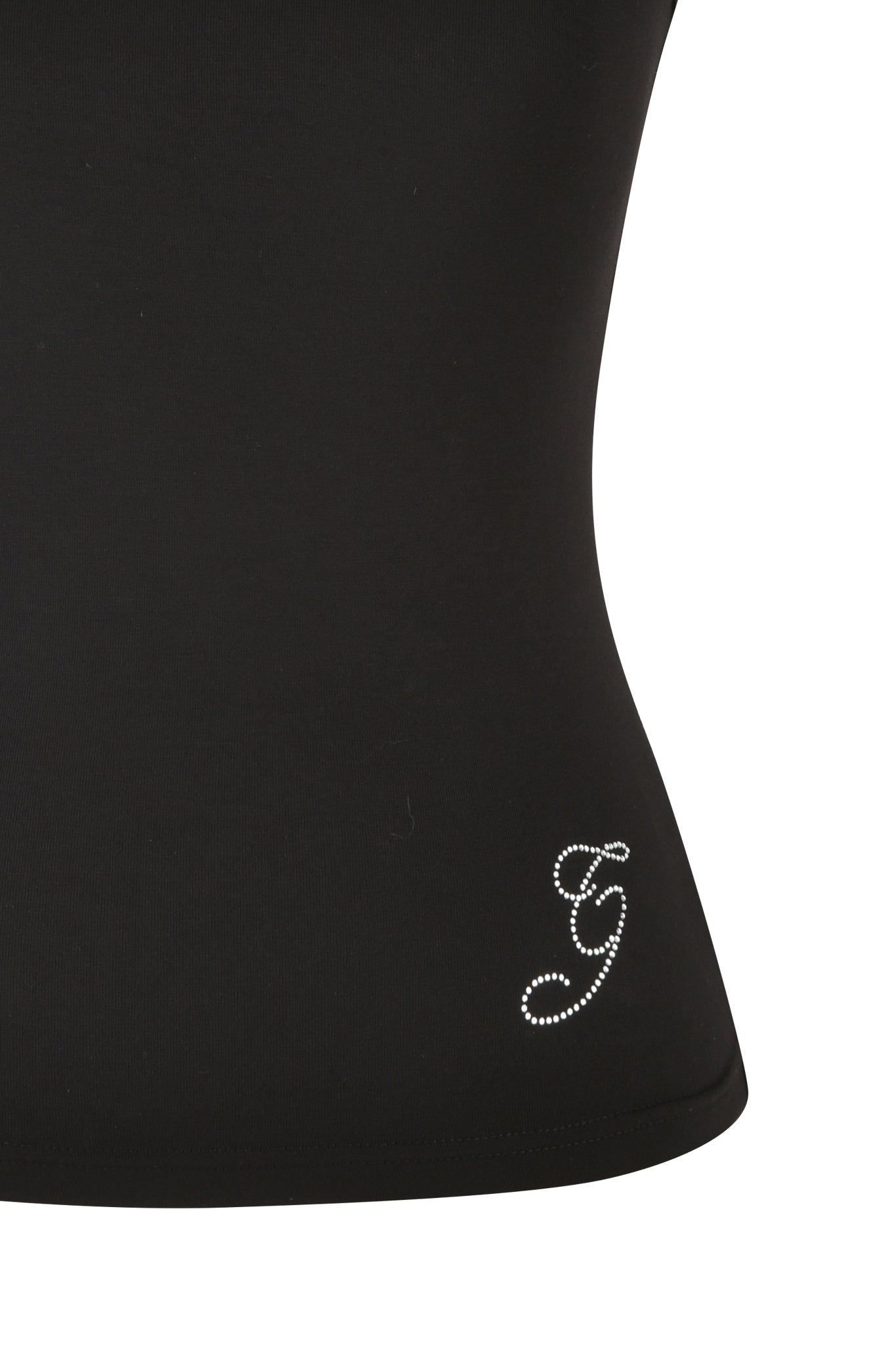 Close-up of the ERIN TOP - BLACK by I.AM.GIA, featuring a small, decorative letter "G" made of tiny, shiny studs near the bottom edge. The bodycon fit enhances its smooth and form-fitting appearance.