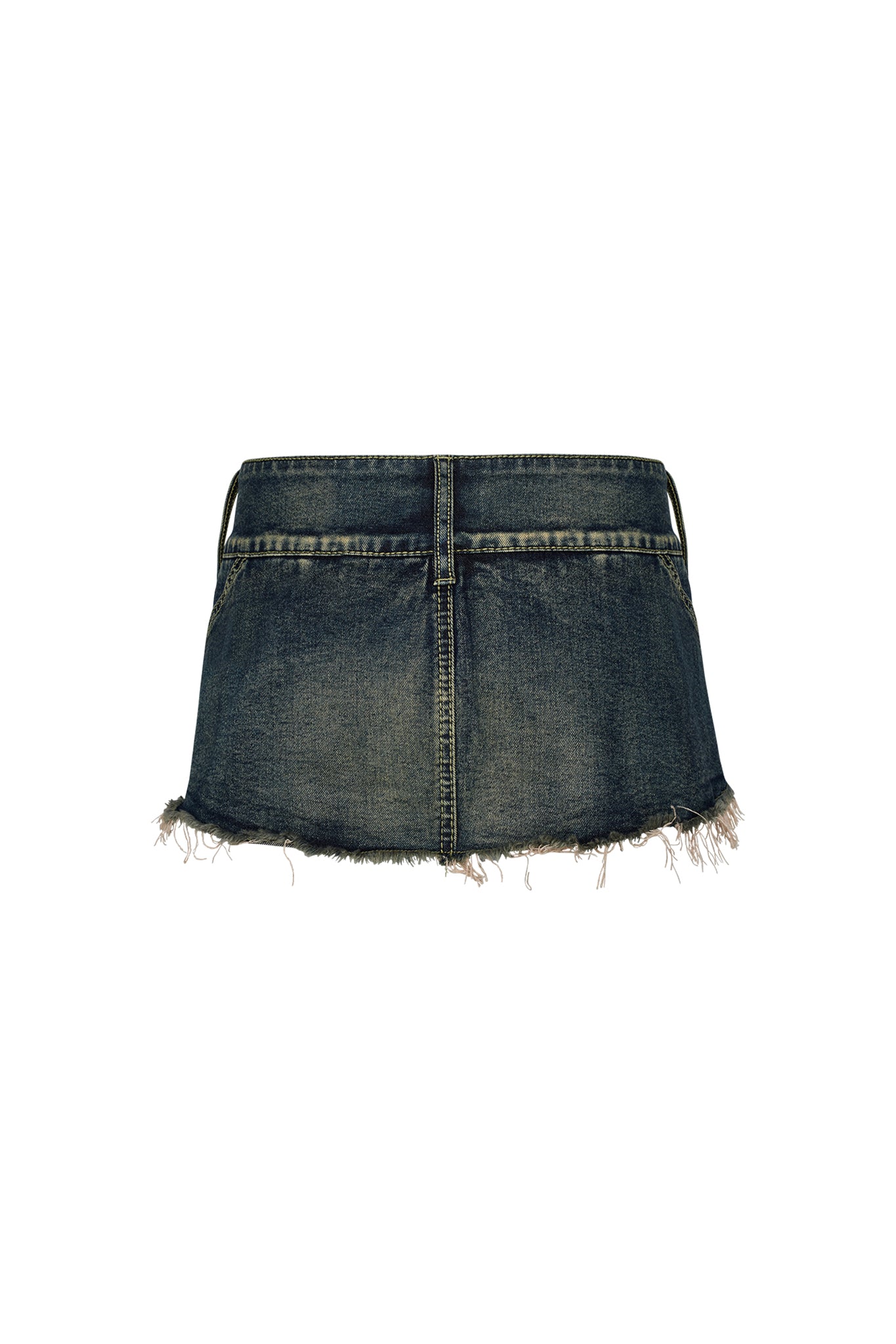 The NYKKO SKORT - BLUE by I.AM.GIA is a cropped denim blue skort featuring a raw, frayed hem. It comes with two back pockets and belt loops at the waist. The denim exhibits a slightly worn texture, contributing to its vintage look. The image is centered on a white background.