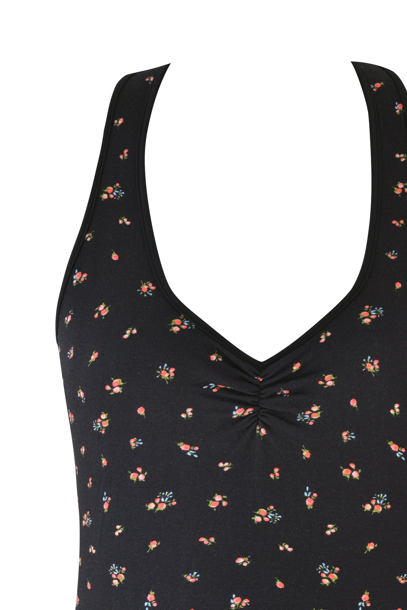 Close-up of the CELESTE TOP - BLACK : DITSY FLORAL by I.AM.GIA, showcasing a V-neckline and subtle bust gathering. The sleeveless design features small red, blue, and green floral patterns.
