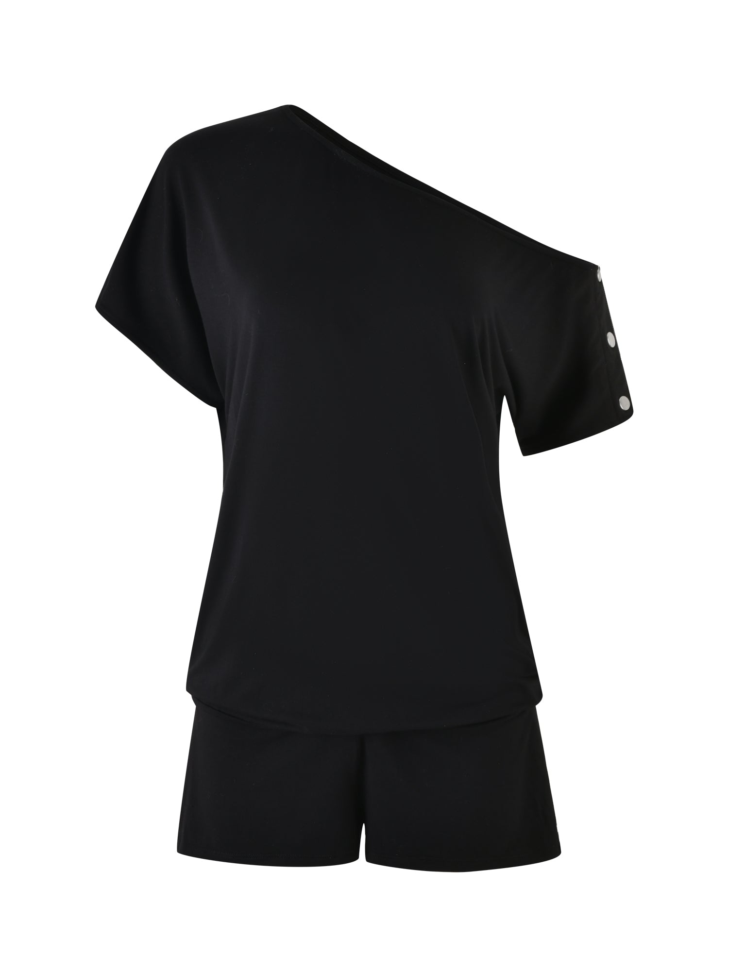 An I.AM.GIA EZIA ROMPER in black featuring a one-shoulder design with button details near the shoulder on a short sleeve. This outfit is made from soft, comfortable fabric that complements the ensemble perfectly.