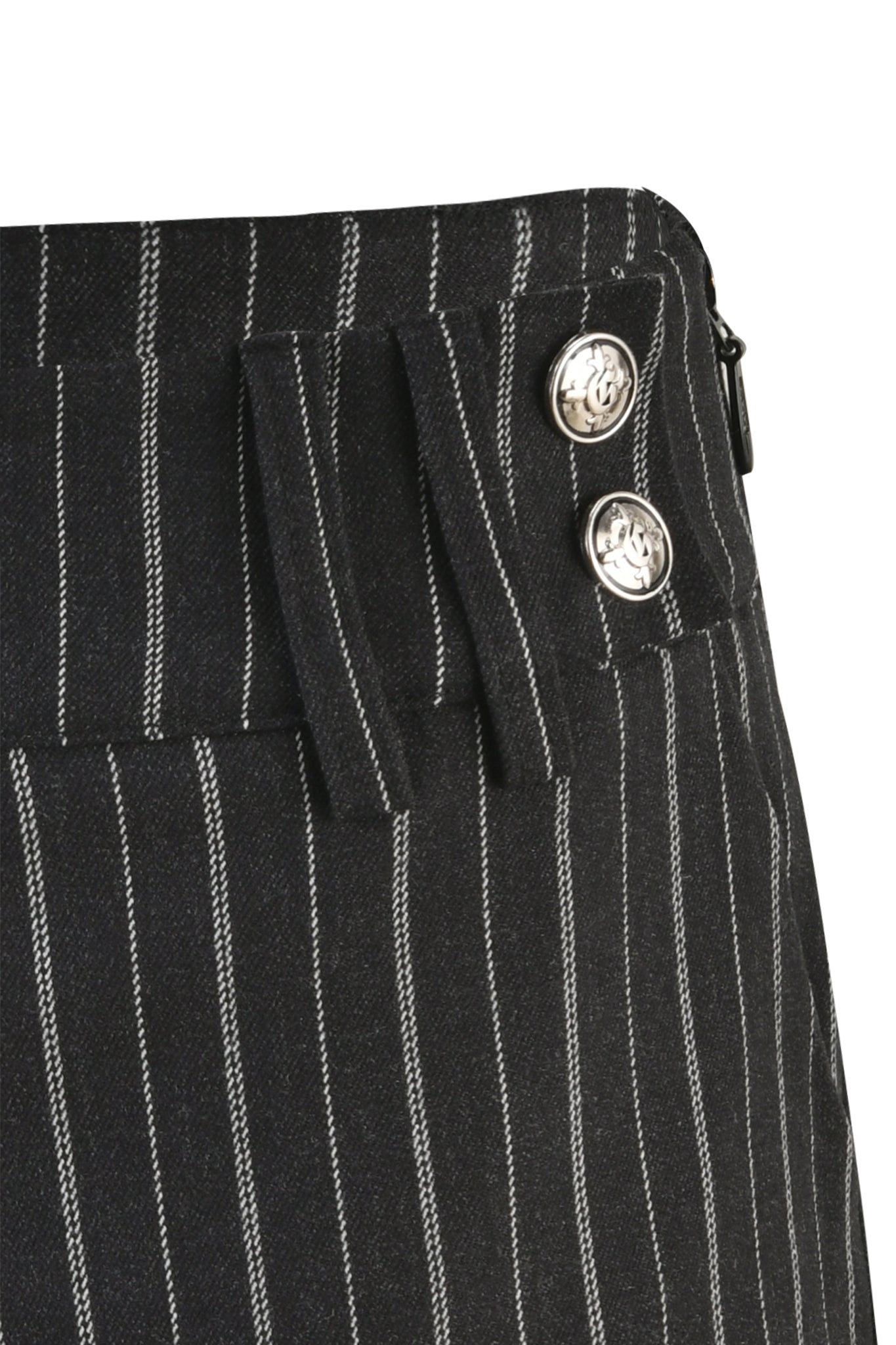 Close-up of the waistband of the SADIE SHORT - BLACK by I.AM.GIA, featuring white vertical pinstripes. The tailored silhouette is adorned with two silver floral-design buttons on the side, complemented by belt loops and a visible zipper on the right edge.