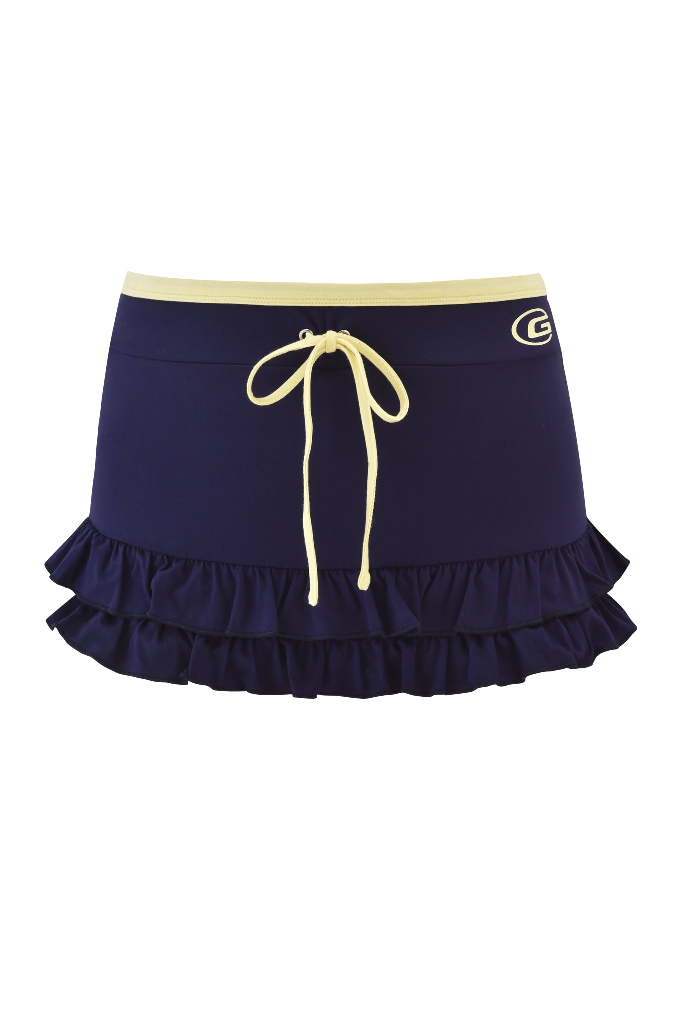 The MICHELLE SKORT - NAVY by I.AM.GIA features a low rise, navy blue design with a yellow drawstring waist, ruffled hem, and a small "G" logo on the upper left side.