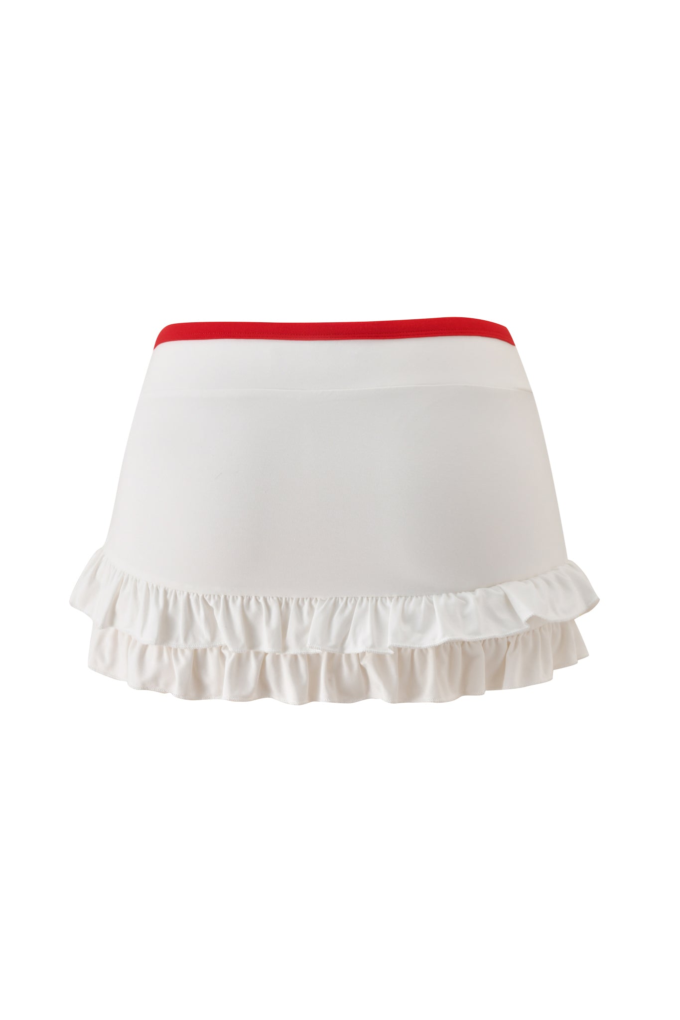 The MICHELLE SKORT - WHITE by I.AM.GIA is a white micro mini skort with a low-rise waist, red waistband, and double ruffle hem, shown on a plain white background.