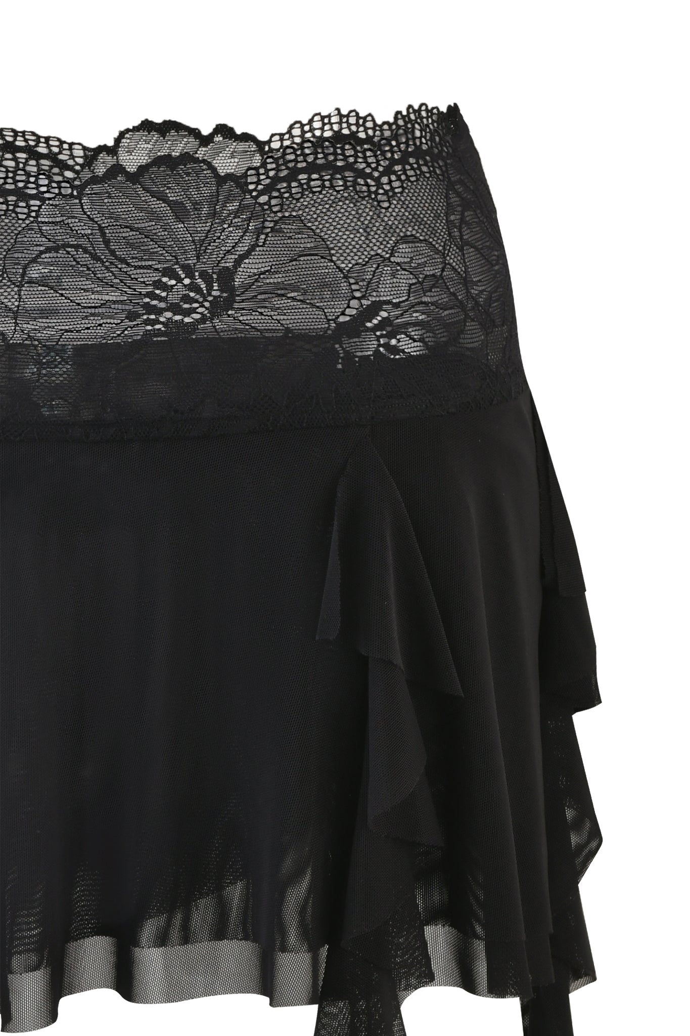 A close-up image of the SILO SKIRT - BLACK by I.AM.GIA, showcasing its intricate floral lace detailing at the waistband. This mini-length skirt features layers of soft, flowing fabric with ruffled edges, creating a delicate and elegant look. The hem is asymmetrical with a sheer finish at the bottom.