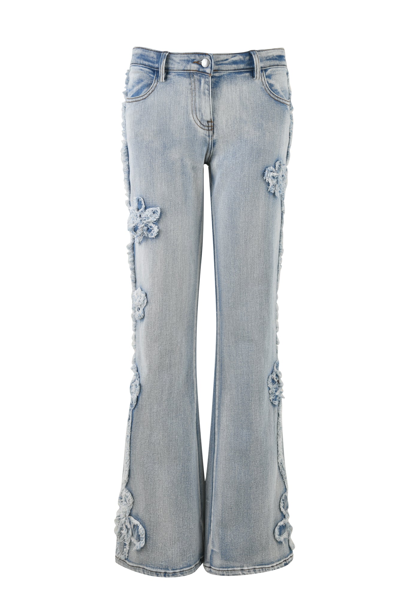 The TYLA JEAN - BLUE from I.AM.GIA is a pair of light blue denim jeans featuring a flared leg and floral appliqué details on the thighs, knees, and lower legs. The jeans have a classic five-pocket design, belt loops, and a button-and-zipper closure at the waist.