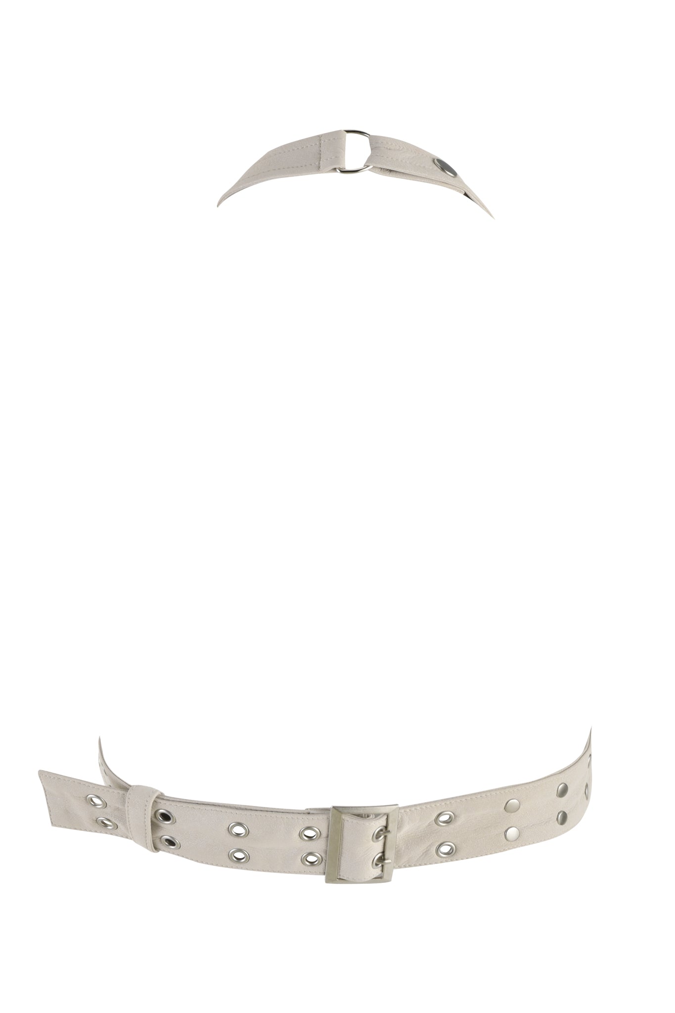 A close-up view of the DOLLY TOP - NEUTRAL : TAN by I.AM.GIA, a cream faux leather harness belt adorned with metal grommets and buckles. The top part of the harness showcases a smaller strap with a buckle, while the bottom section features a wider strap, also equipped with a buckle and multiple grommets.