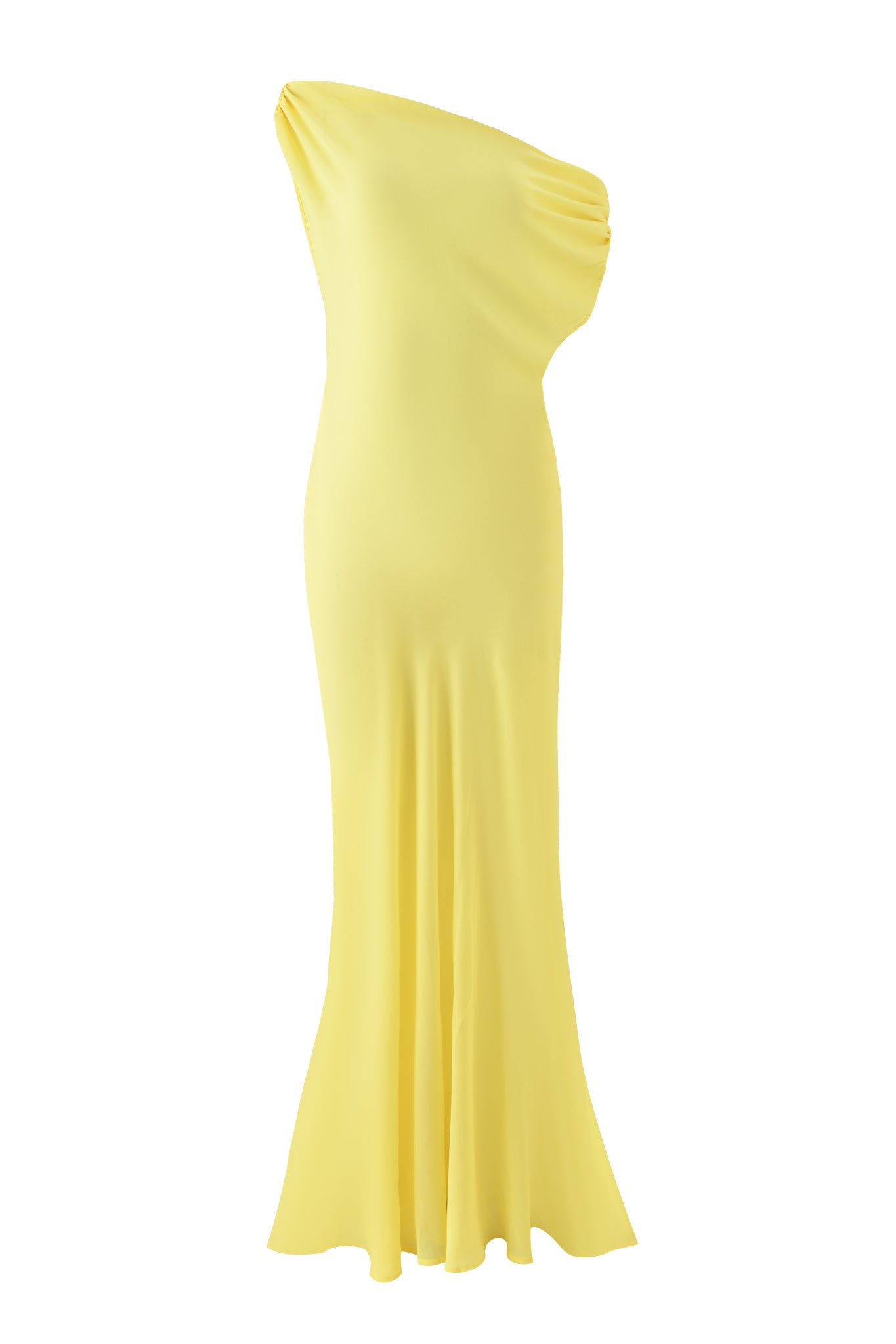 The KAHLO MAXI DRESS by I.AM.GIA is a light yellow georgette dress featuring a one-shoulder design, fitted silhouette, and gentle flare at the hem. The smooth fabric drapes elegantly for a sophisticated look.