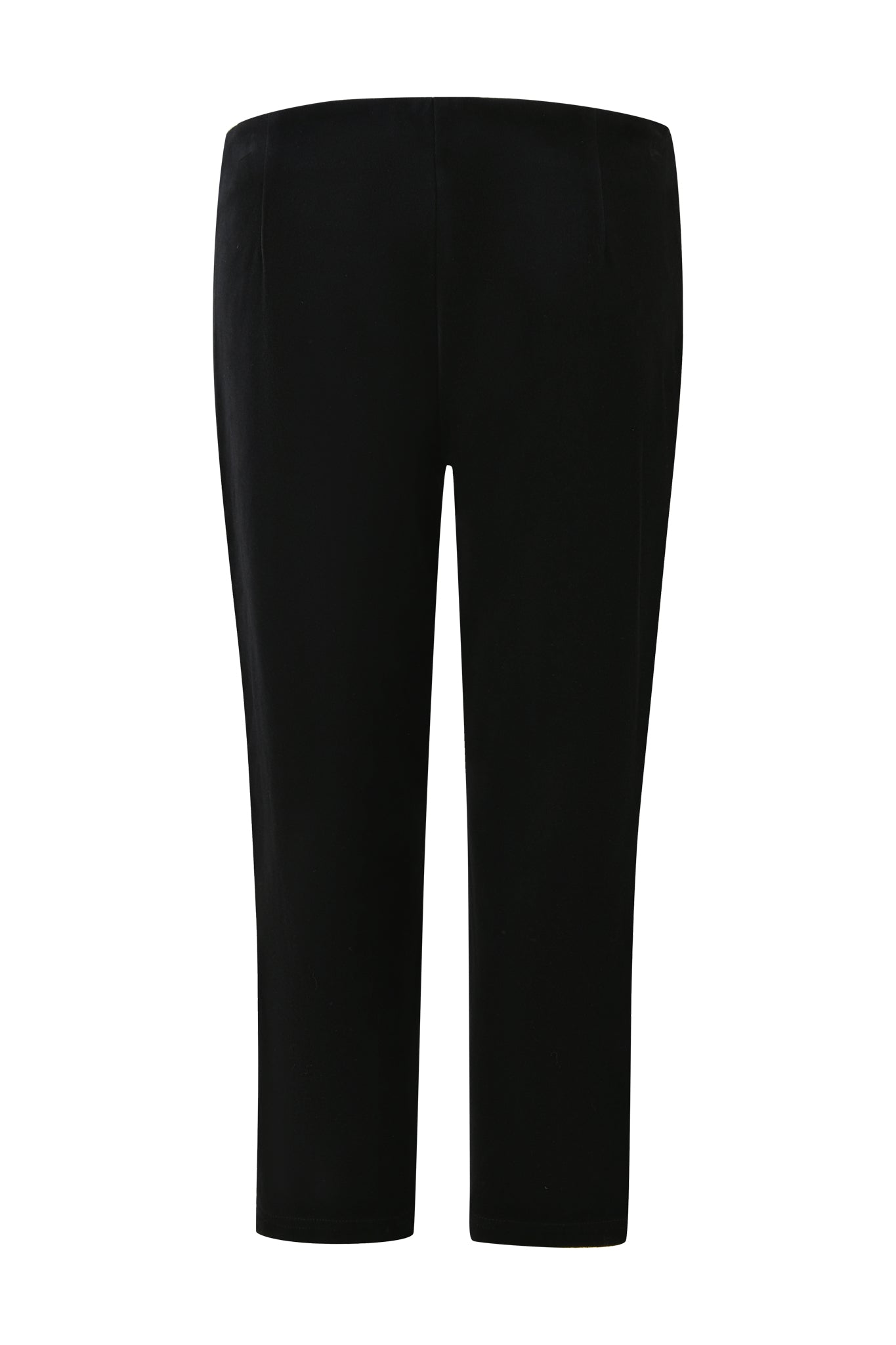 The LAURA VELVET LEGGING - BLACK by I.AM.GIA are black, straight-leg pants crafted from a luxurious velour material, presented against a simple white backdrop. These mid-rise leggings feature a sleek, pocket-free design with no added embellishments, emphasizing their minimalist aesthetic and hinting at a bodycon fit.