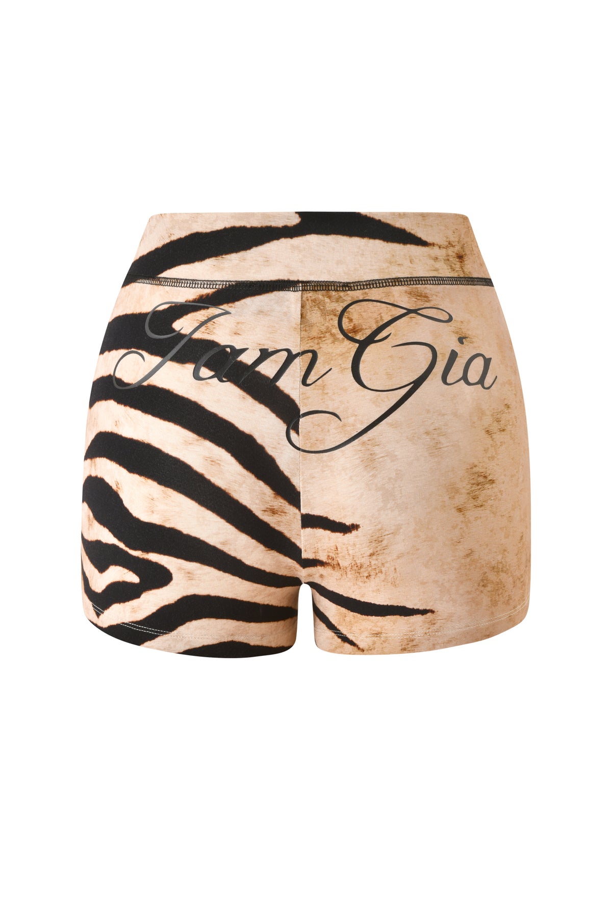 Make a statement with the BLARE SHORT - WILD SIDE from I.AM.GIA. These mini shorts feature a high-waisted elastic waistband, bold zebra print on one side contrasted by a lighter tan on the other, and the signature “IamGia” cursive text across the back—a striking addition to your I.AM.GIA collection.