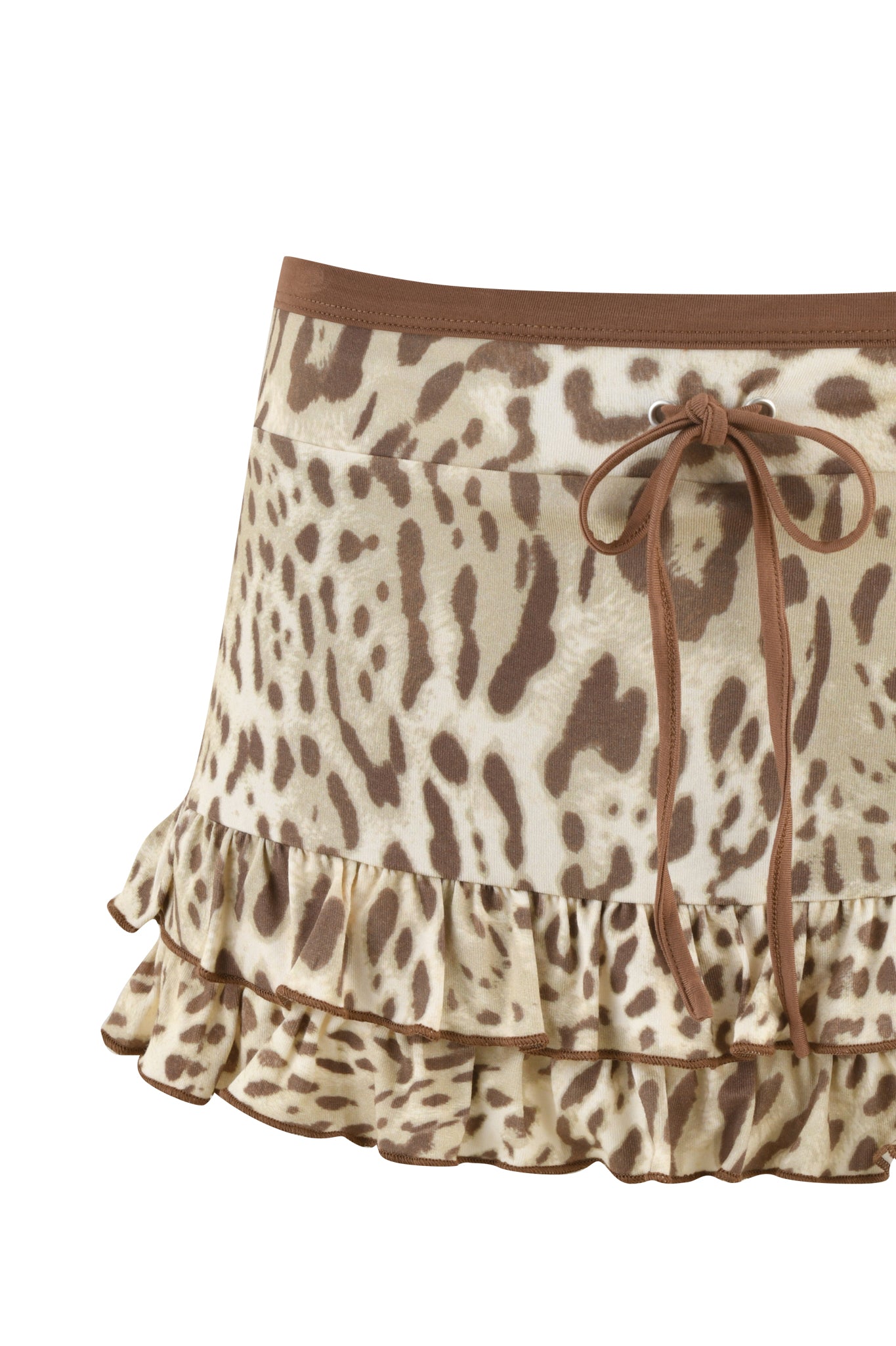 Introducing the MICHELLE SKORT - NEUTRAL : LEOPARD LIMBO by I.AM.GIA: a chic, short ruffled skirt adorned with a captivating brown and cream leopard print. This piece features a flirty Leopard Limbo design and an adjustable brown drawstring waistband, embodying effortless style.