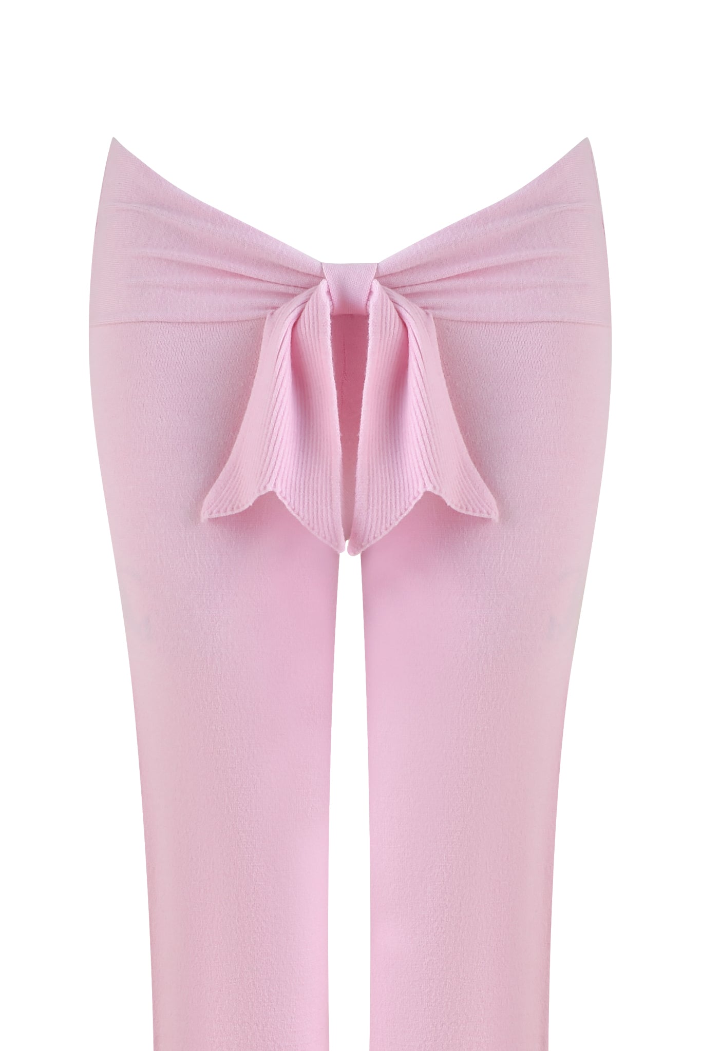 The MORGANA PANT - PINK from I.AM.GIA features a close-up of baby pink stockings with a ribbed texture and a stylish, ruffled bow at the waistband, offering a soft and stretchy feel that showcases its creative design.
