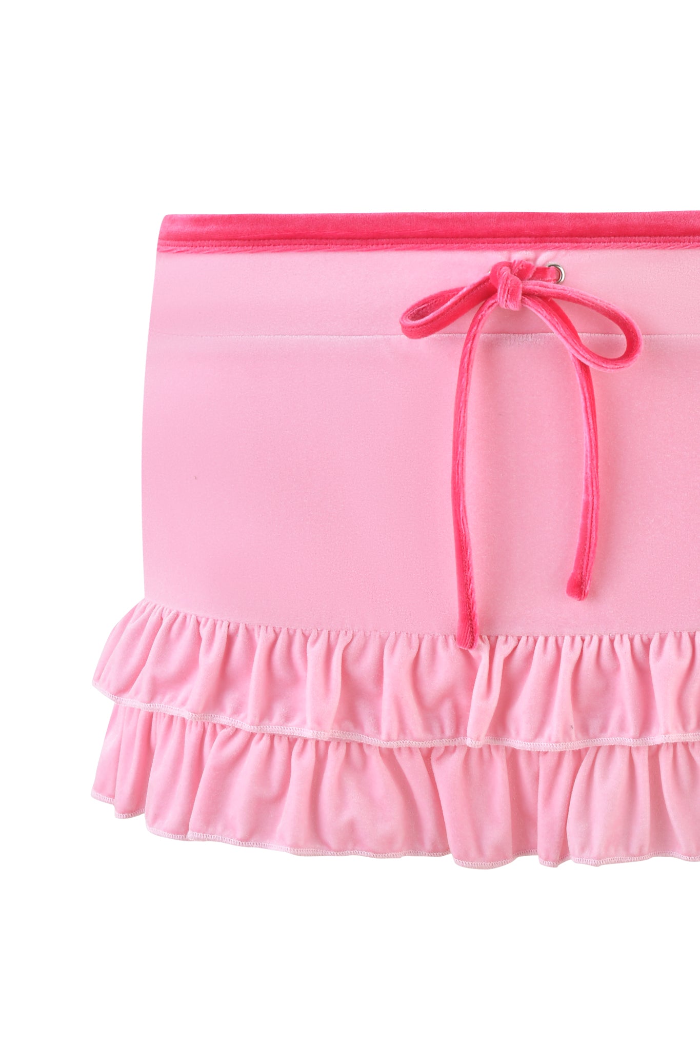 The MICHELLE VELOUR MINI SKORT - PINK by I.AM.GIA is a charming low-rise piece with two tiers of frills at the bottom. It features a vibrant waistband and matching drawstring bow, crafted from soft, lightweight fabric for comfort and style.