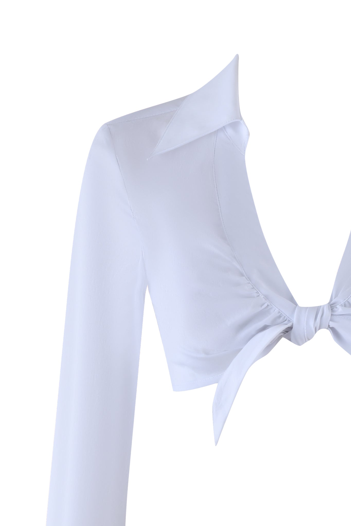 Close-up of the MILLER TOP - WHITE by I.AM.GIA; this long-sleeved blouse features a deep neckline, adjustable tie-front, tailored fit, and wide collar. It is set against a plain white background.