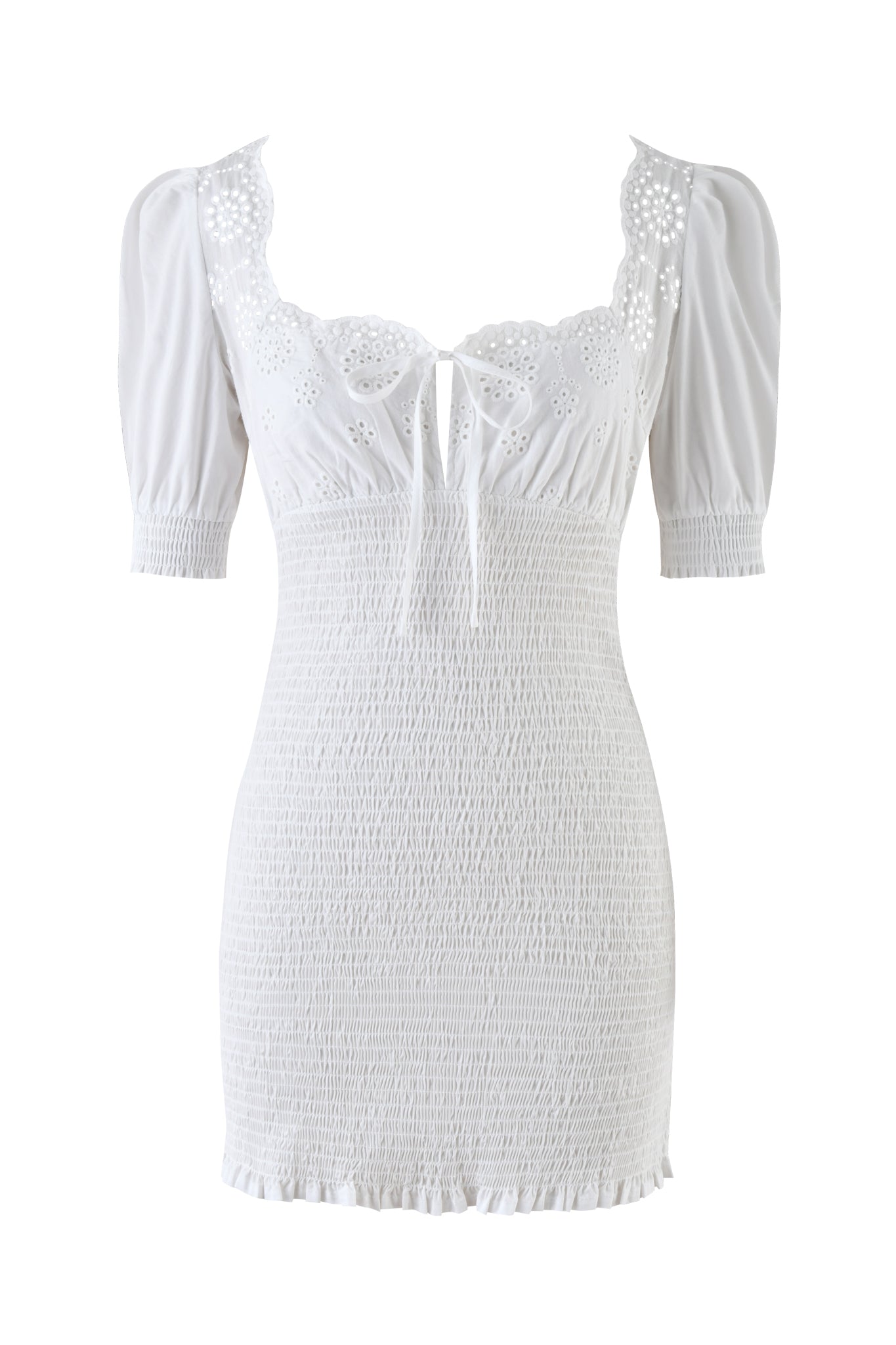 Meet the LEVI MINI DRESS - WHITE by I.AM.GIA: A white smocked, bodycon mini dress with a ruched bodice, lace-detailed shoulders, a sweetheart neckline with front tie, and a ruffled hem.