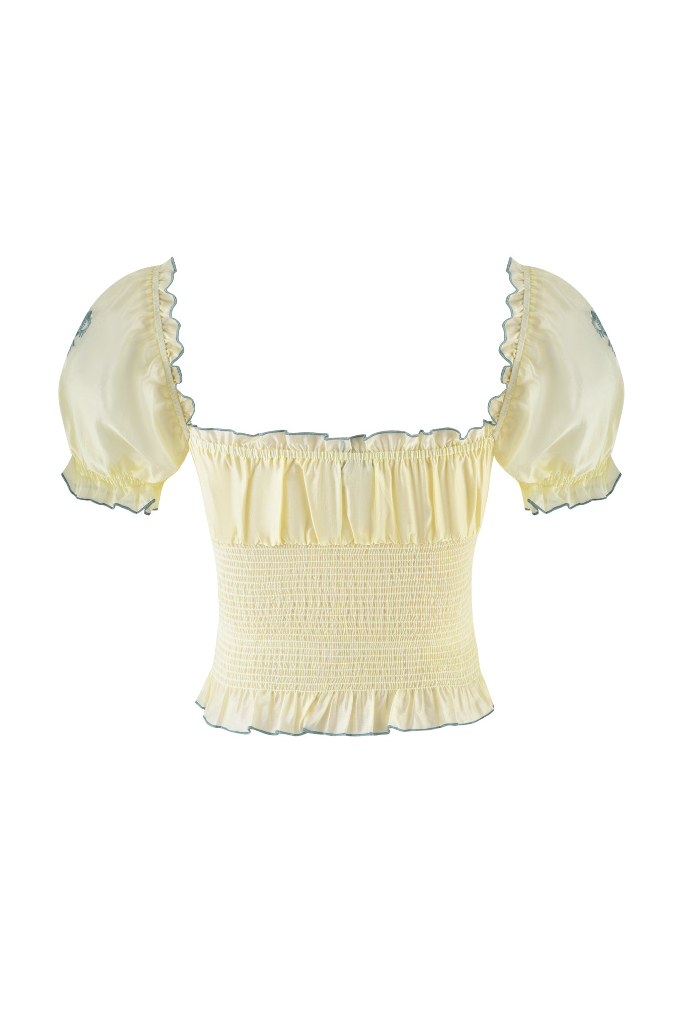 The CLOVER TOP - YELLOW by I.AM.GIA is a pale yellow smocked top with puffed sleeves and a square neckline, featuring a charming smocked bodice. Ruffled trims on the sleeves and hem add a whimsical touch.