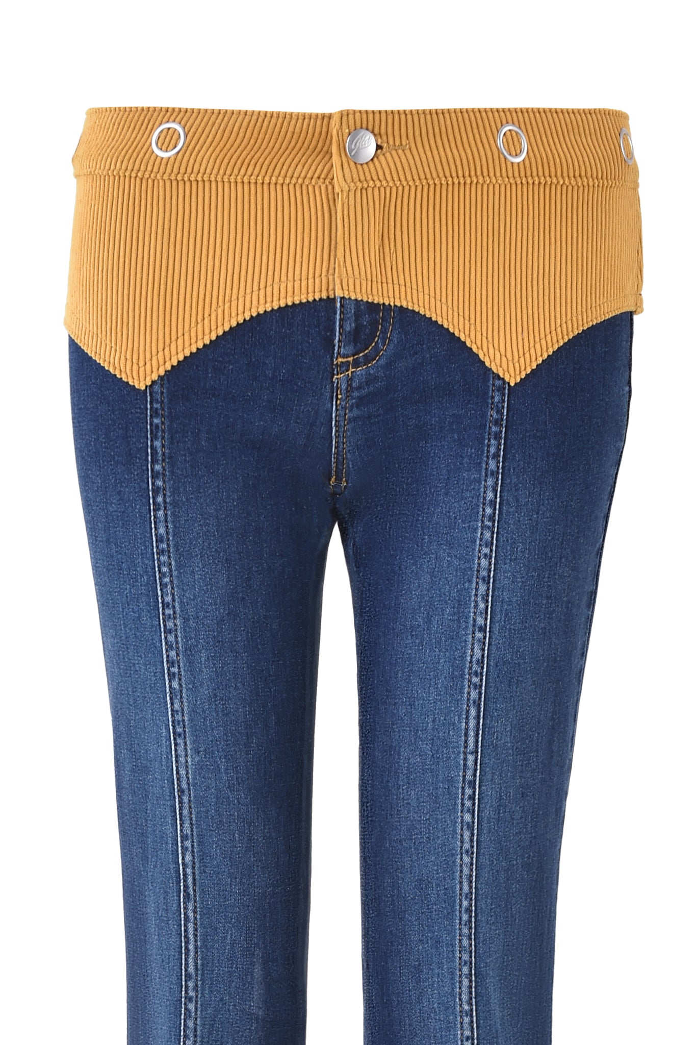 The TOMMIE JEAN - DARK WASH by I.AM.GIA are denim flared pants with a high-waisted fit, mustard yellow corduroy waistband, metal buttons, V-shaped front detail, and custom GIA embroidery.