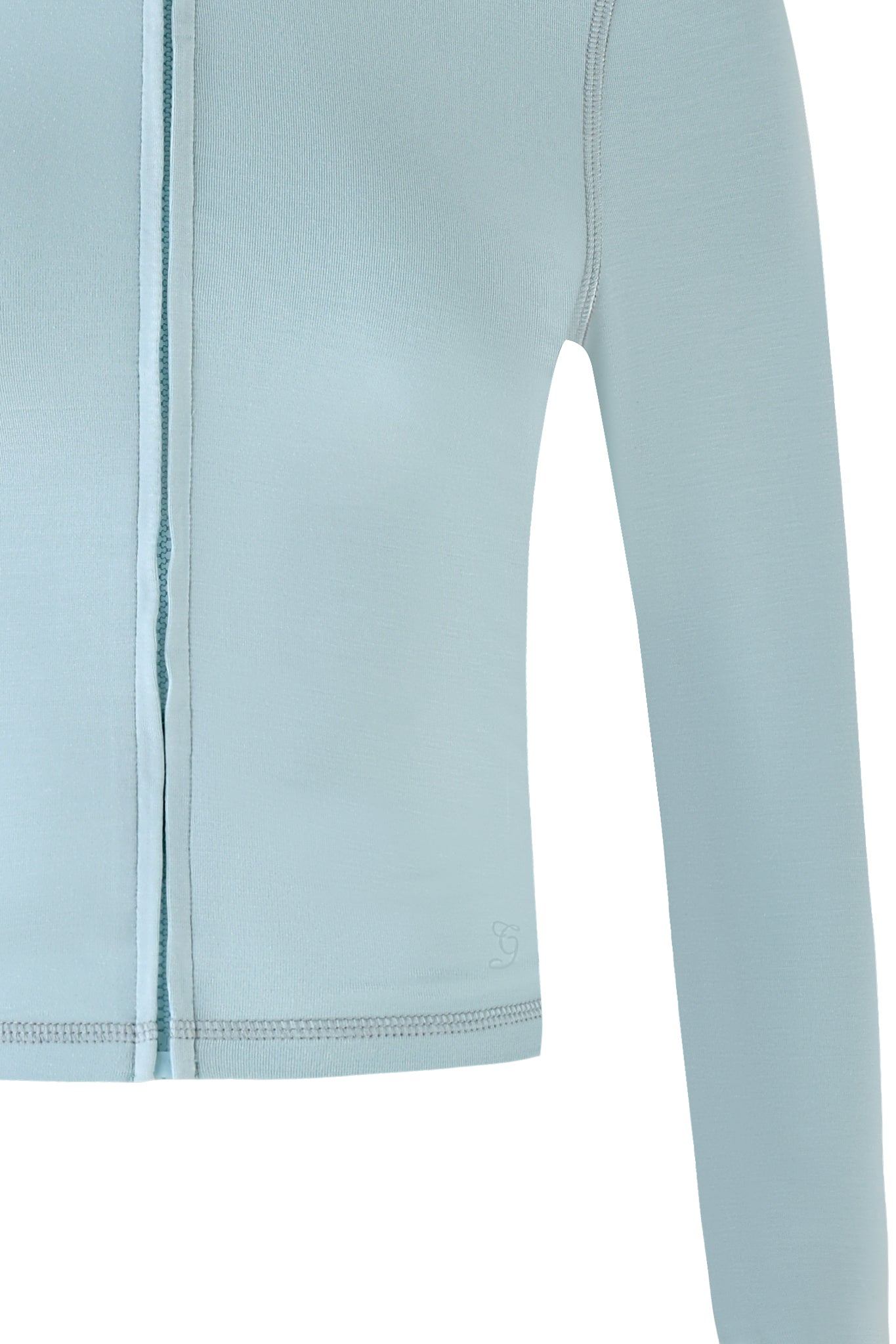 Close-up of the BLARE HOODIE by I.AM.GIA in a seafoam colorway. The image highlights the fabric texture and seams on the side torso and sleeve, with a slightly cropped hem for a modern twist.