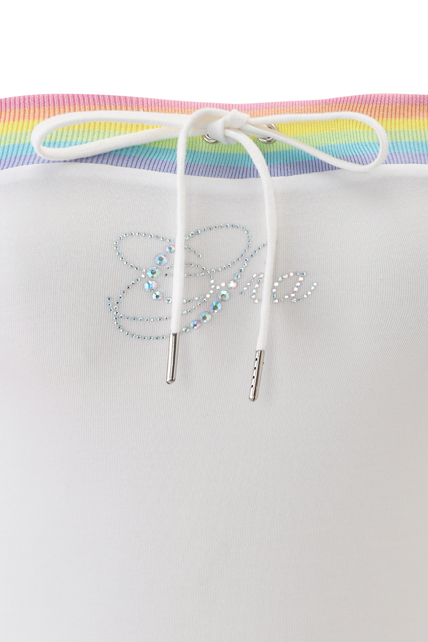 Close-up of the NIJI BOOB TUBE in white by I.AM.GIA, made from bamboo jersey fabric with rainbow-striped trim. A white drawstring bow and iridescent rhinestones spelling "Era" with a butterfly outline embellish the soft material.