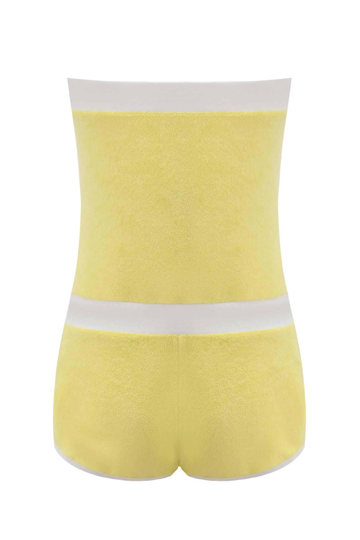 The GOLDIE ROMPER in yellow by I.AM.GIA features high-waisted, pastel yellow terry cloth shorts with a dolphin hem and white elastic waistband, shown from the back against a white background.