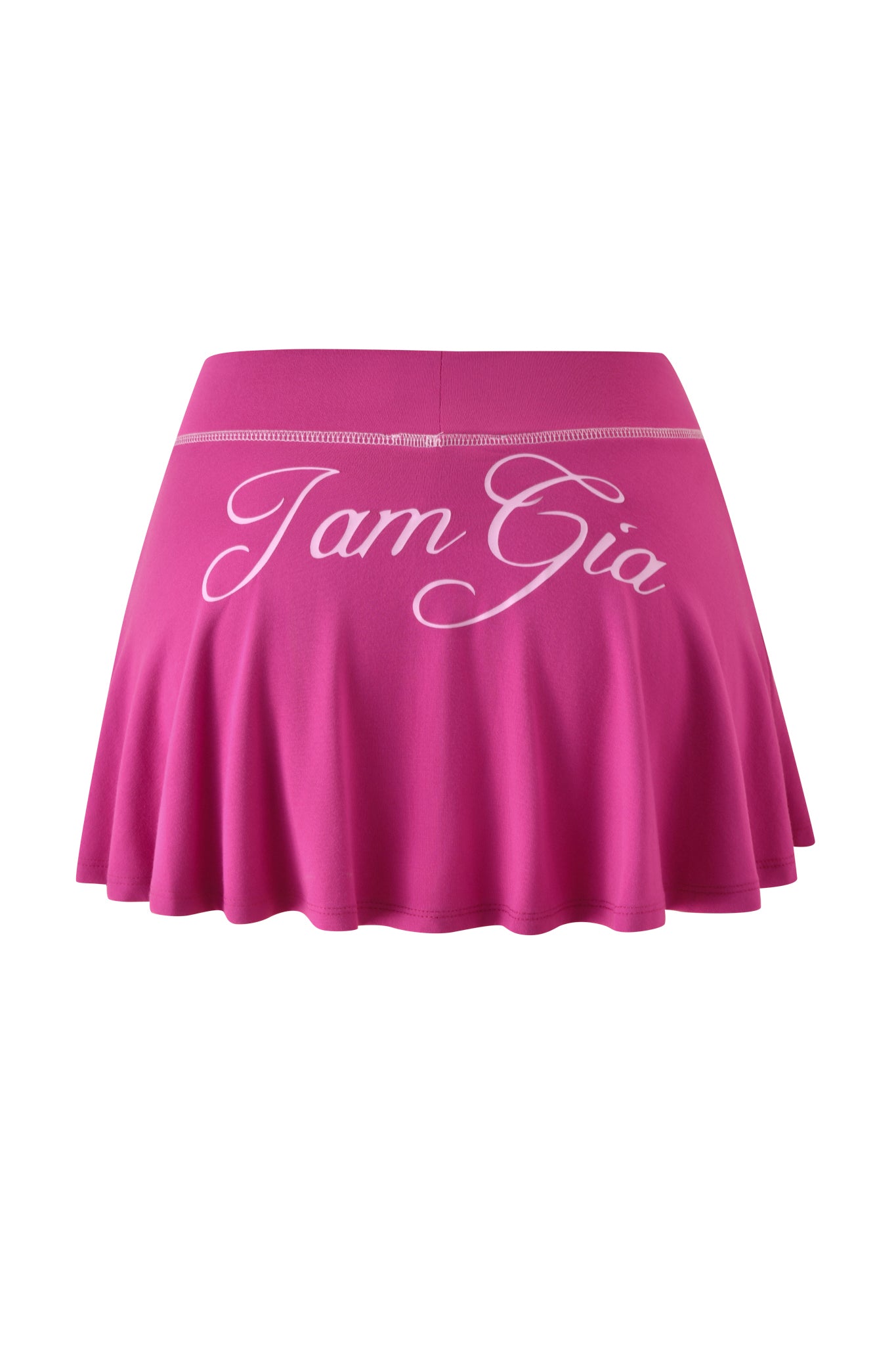 The BLARE SKORT - RASPBERRY by I.AM.GIA features a bright pink raspberry hue, an A-line silhouette with a flared hem, and bold white "I.AM.GIA" cursive lettering on the front.