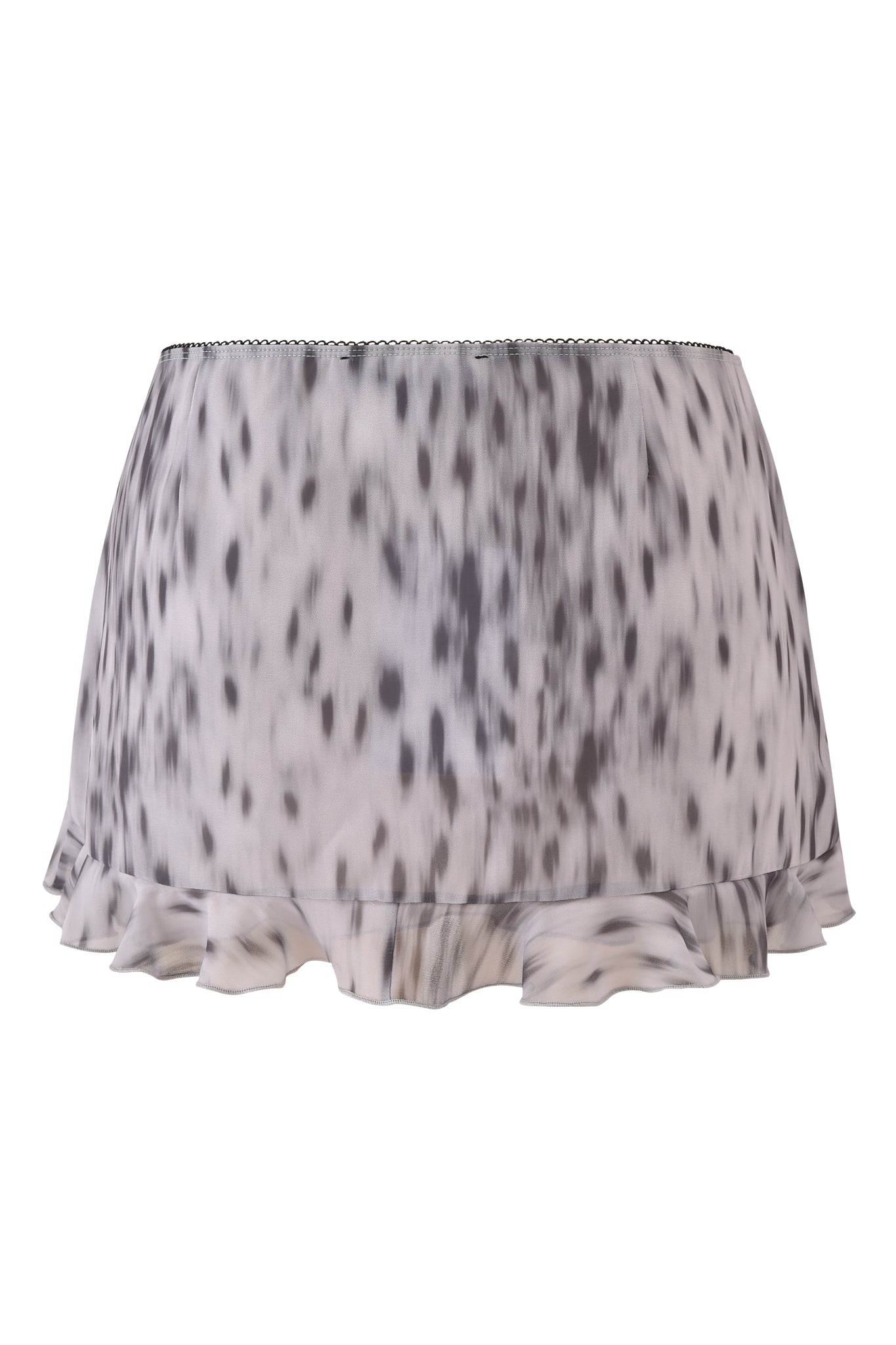 The COLETTE LACE PANEL MINI SKIRT by I.AM.GIA is a short, flowy piece with a black and white leopard print, ruffled hem, and light fabric.