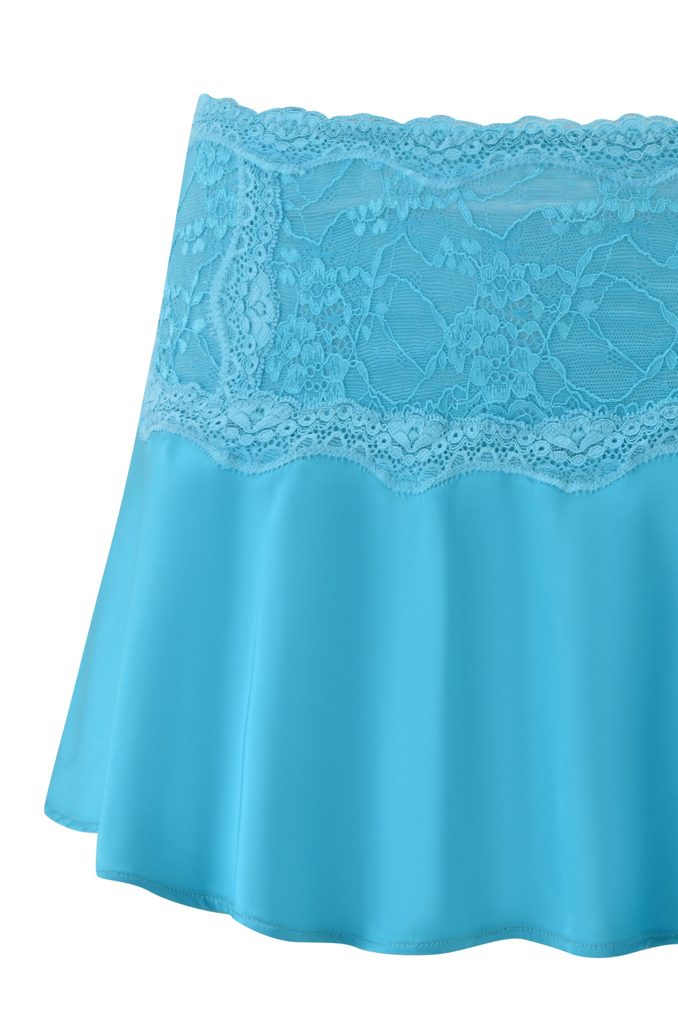 The ASHLING MINI SKIRT - TEAL by I.AM.GIA is a teal satin mini skirt with a floral lace waistband and a smooth, flouncy A-line silhouette.