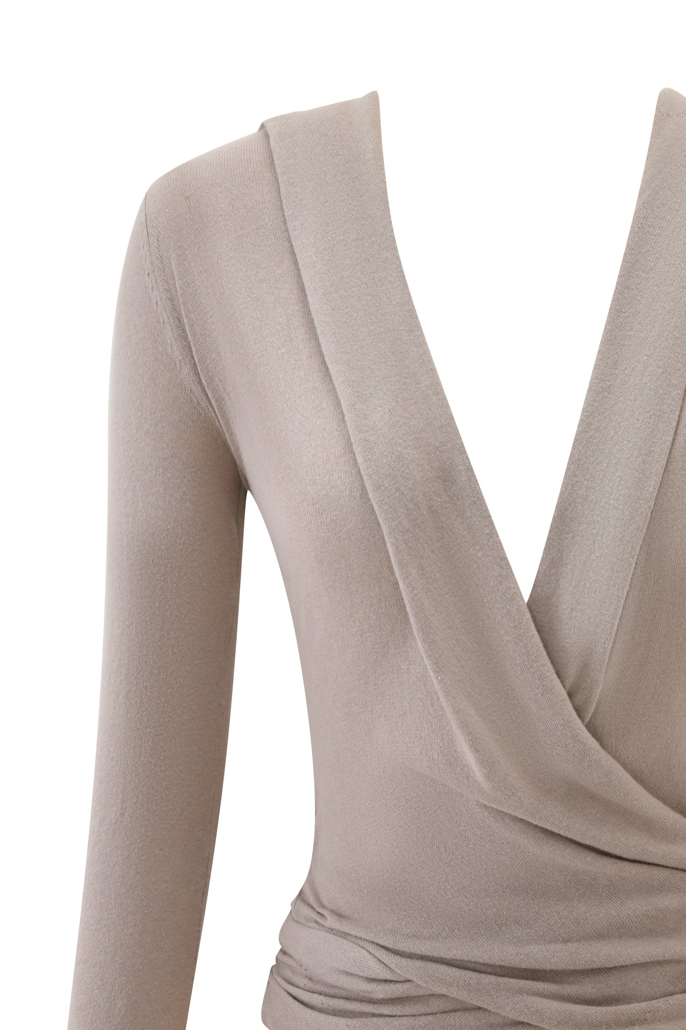 A close-up of the I.AM.GIA IRINA KNIT TOP in beige, featuring long sleeves, a deep V-neckline, and draped knit fabric on a headless mannequin against a white background.