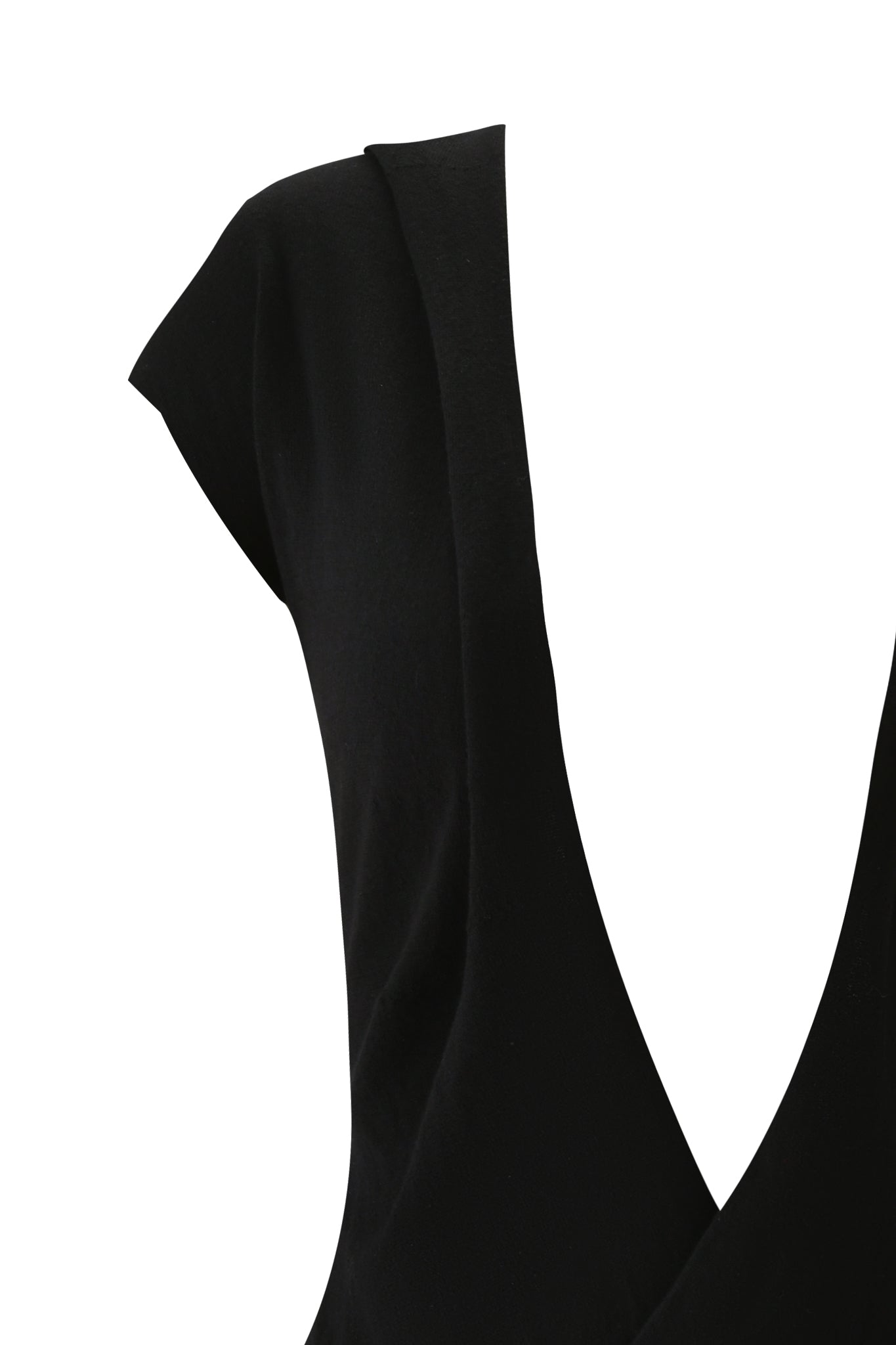 Close-up of the I.AM.GIA NIMA PLAYSUIT in black, a sleeveless piece with a plunging deep V-neckline, shown against a white background. The fabric looks smooth and structured.