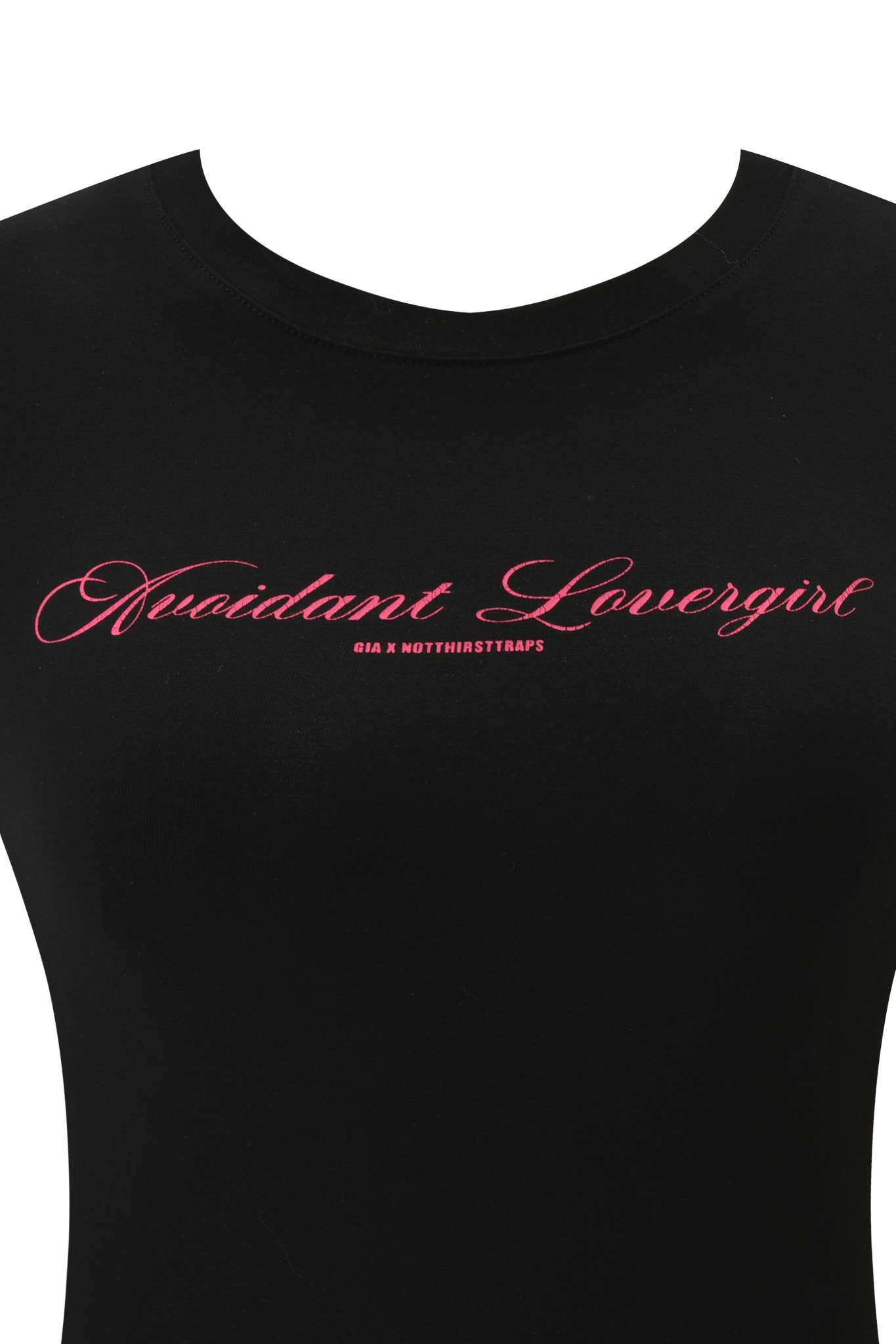 The POLINA AVOIDANT 2.0 TEE by I.AM.GIA is a black fitted baby tee made from lightweight cotton jersey, featuring "Auidant Lovergirl" in pink cursive and "GIA X NOTHIRSTTRAPS" below.