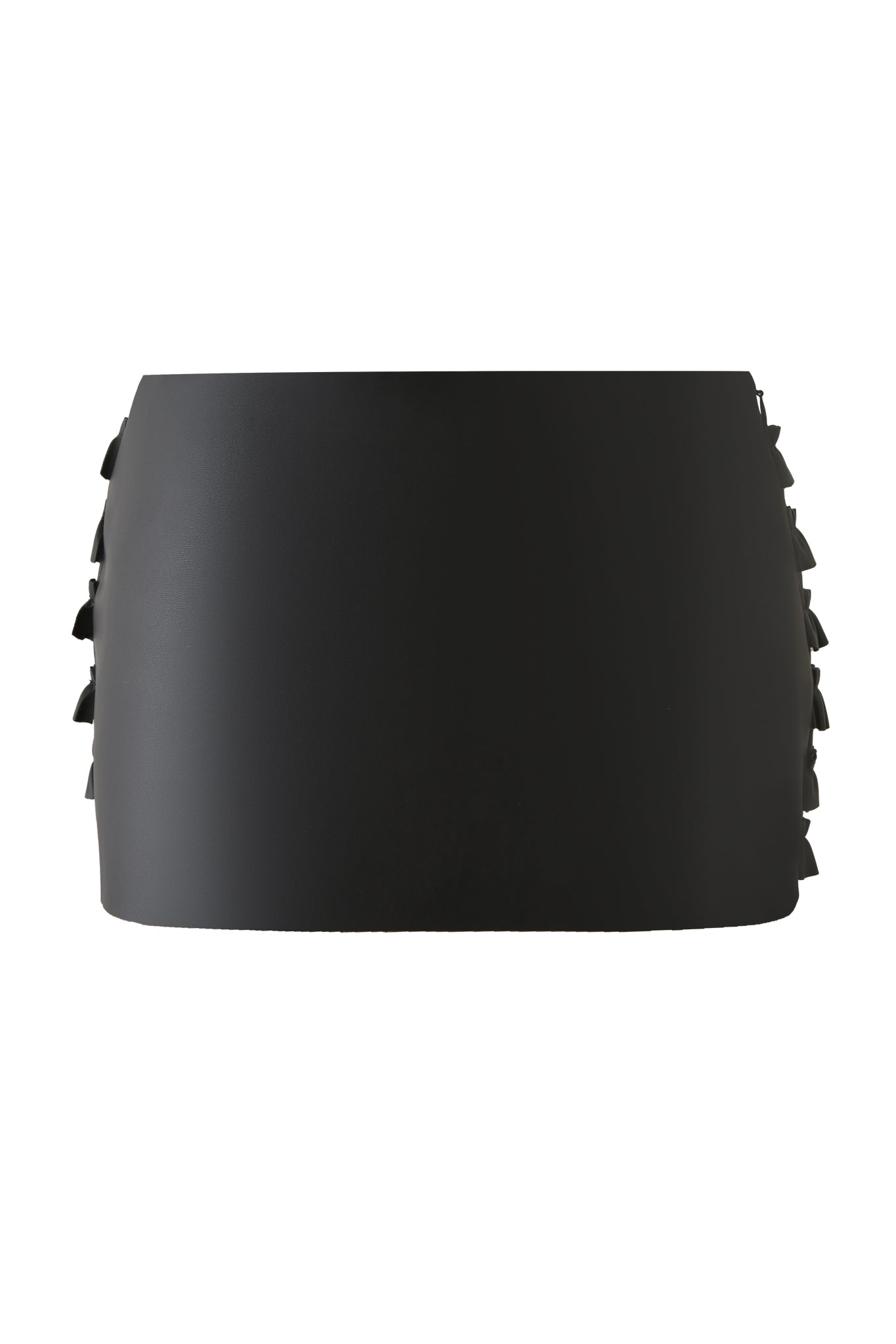 The I.AM.GIA RIVA MICRO MINI SKIRT in black, a high-waisted faux leather skirt with side ruffle details, is shown against a white background.