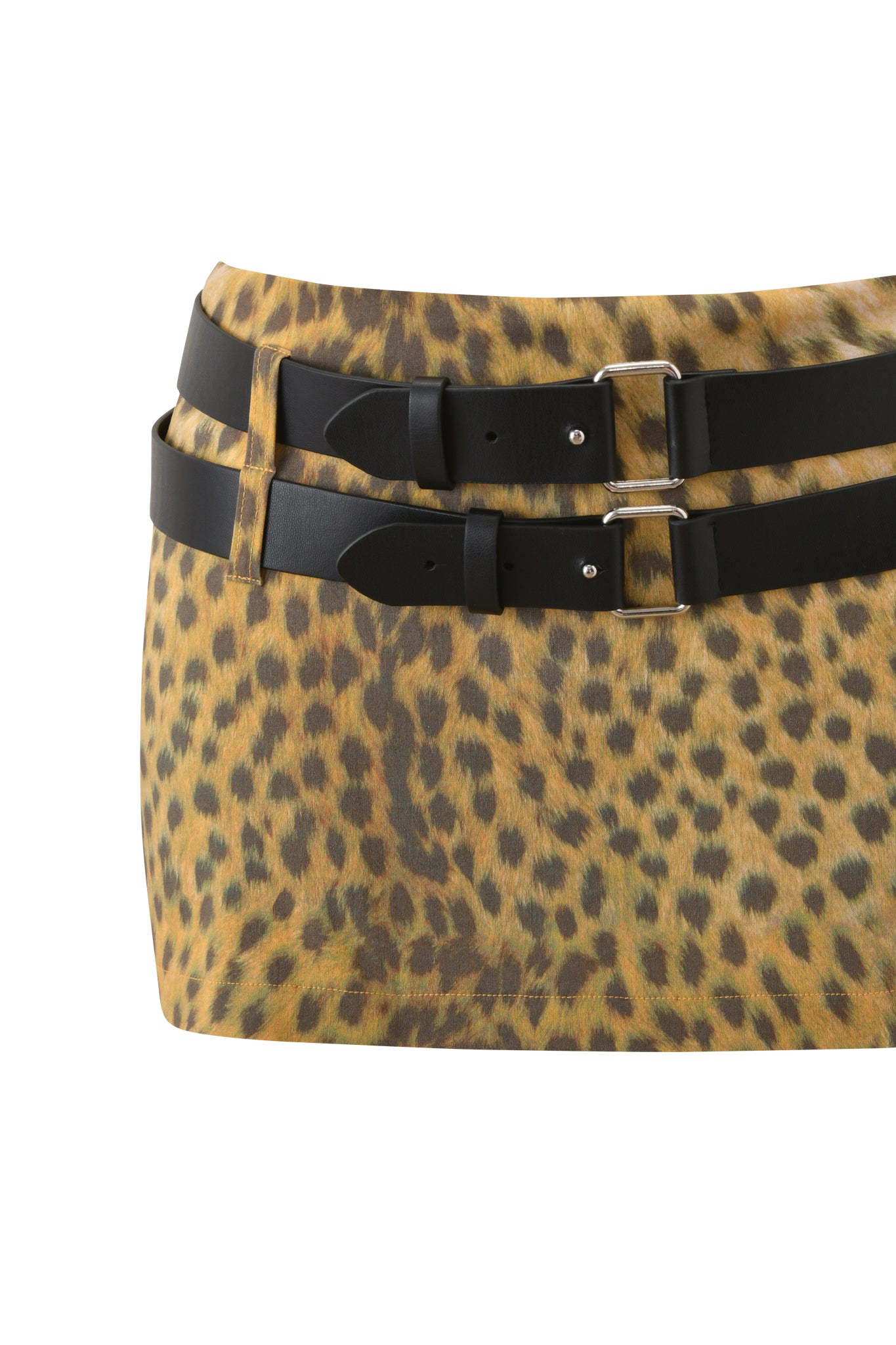 Close-up of the I.AM.GIA DEVON MINI SKORT - CHEETAH, a cheetah print micro mini skort with two silver-buckled faux leather belts at the waist, set against a white background.