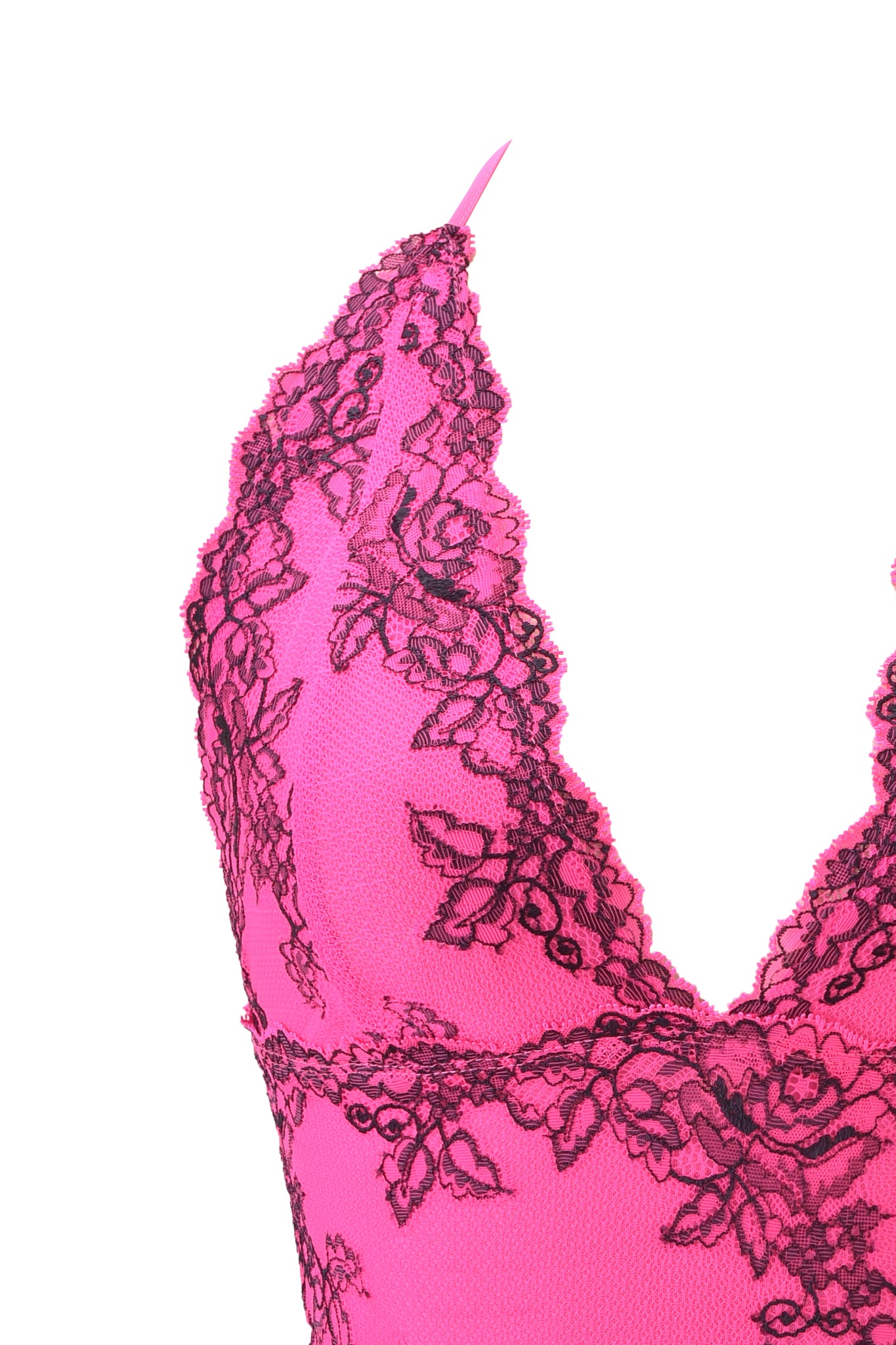 Close-up of the I.AM.GIA GEM HALTER TOP in hot pink, showcasing vibrant color, intricate black floral lace detailing, and delicate scalloped edges, set against a white background.