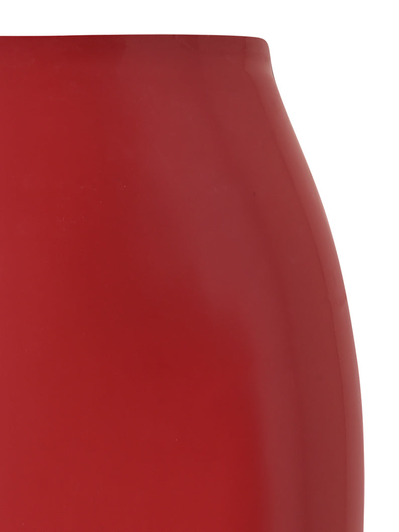 Close-up of the upper portion of a smooth, shiny red vase against a white background, reminiscent of the high-gloss latex finish featured on the I.AM.GIA BUFFY LATEX MIDI SKIRT in red.
