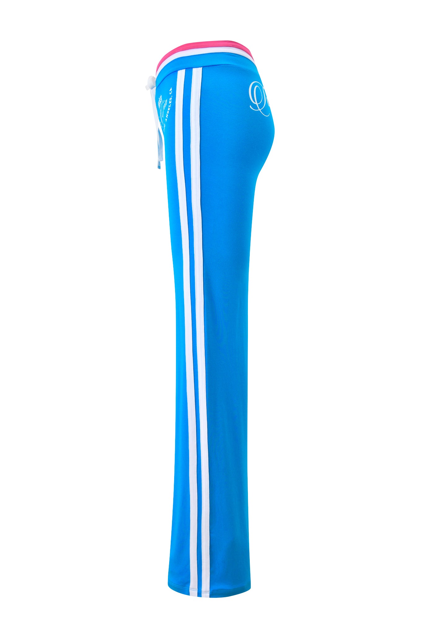 The BLARE STRIPED TRACKPANT - SKY BLUE by I.AM.GIA features sky blue stripes, double white side stripes, a pink waistband with white drawstring, and a white I.AM.GIA logo on the upper hip. Shown on a mannequin from the side.