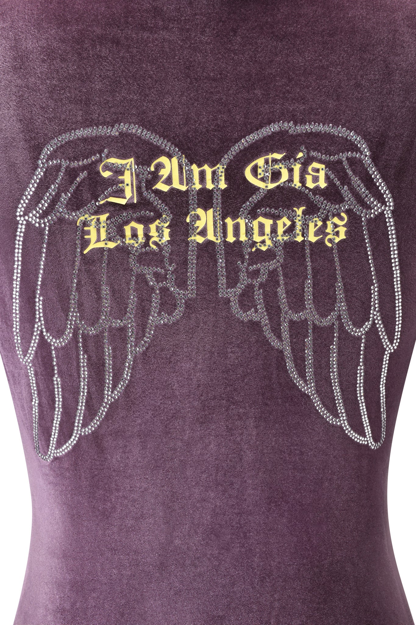 The BLARE VELOUR POCKET HOODIE - PURPLE by I.AM.GIA features rhinestone-outlined angel wings and a gold "I Am Gia Los Angeles" script logo across the center of the wings.