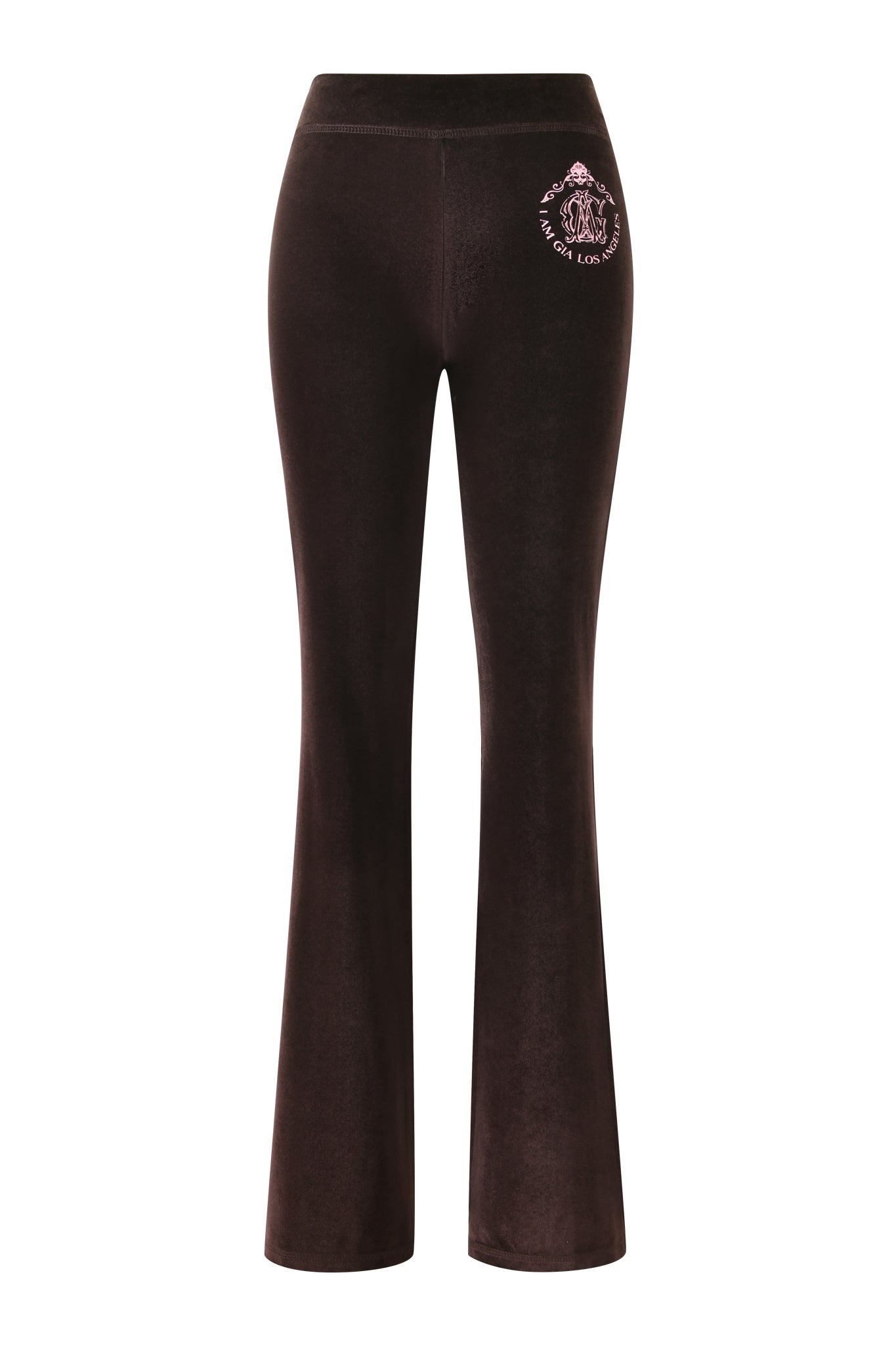 The BLARE VELOUR POCKET TRACKPANT in chocolate by I.AM.GIA features a sculpted fit, flared legs, and a pink embroidered crest with script logo on the right hip, as seen from the back.