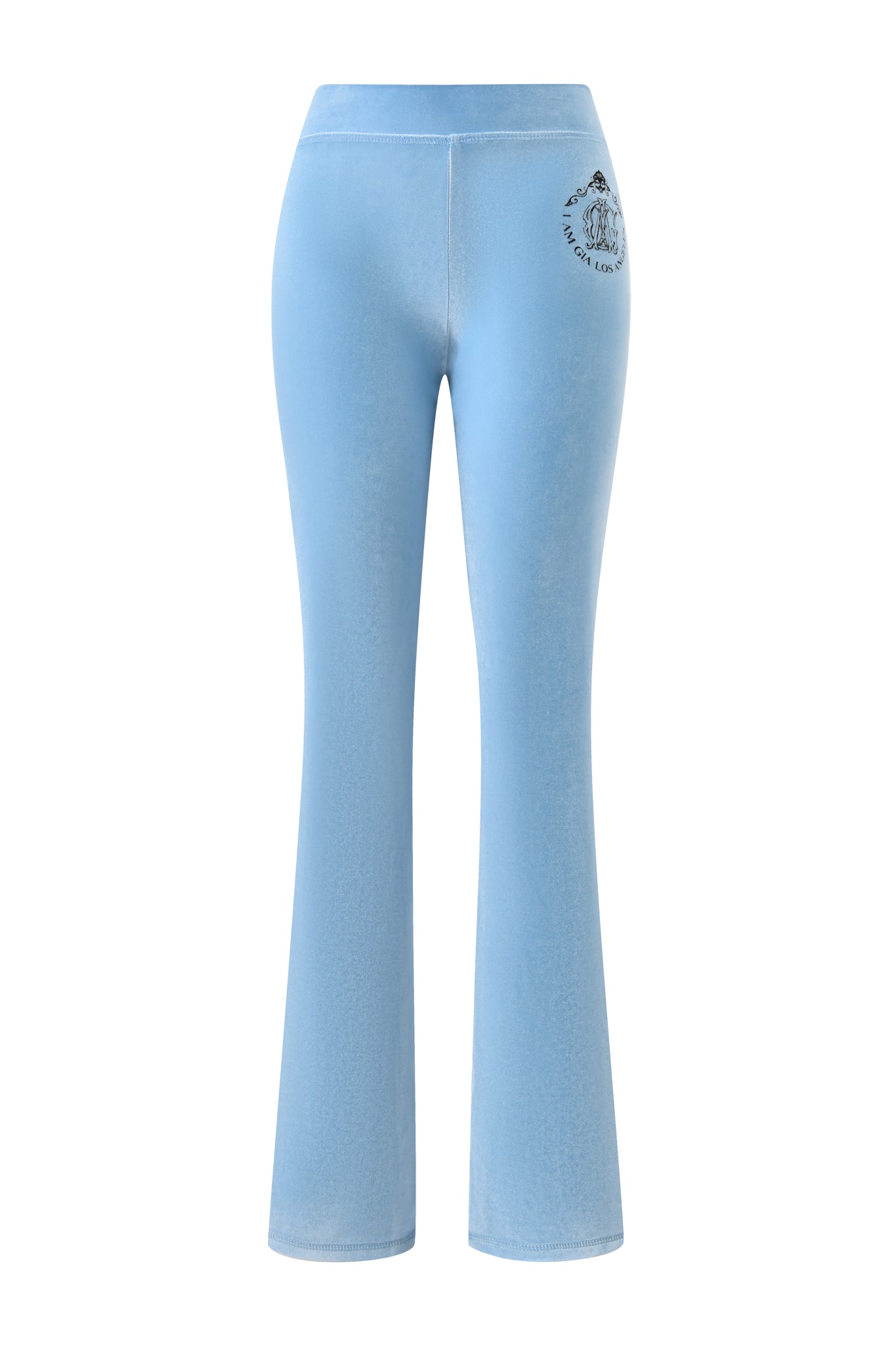 The BLARE VELOUR POCKET TRACKPANT - ICE BLUE by I.AM.GIA features a high-waisted, flared fit and is shown from the back with a small black circular I.AM.GIA logo near the right side of the waistband.