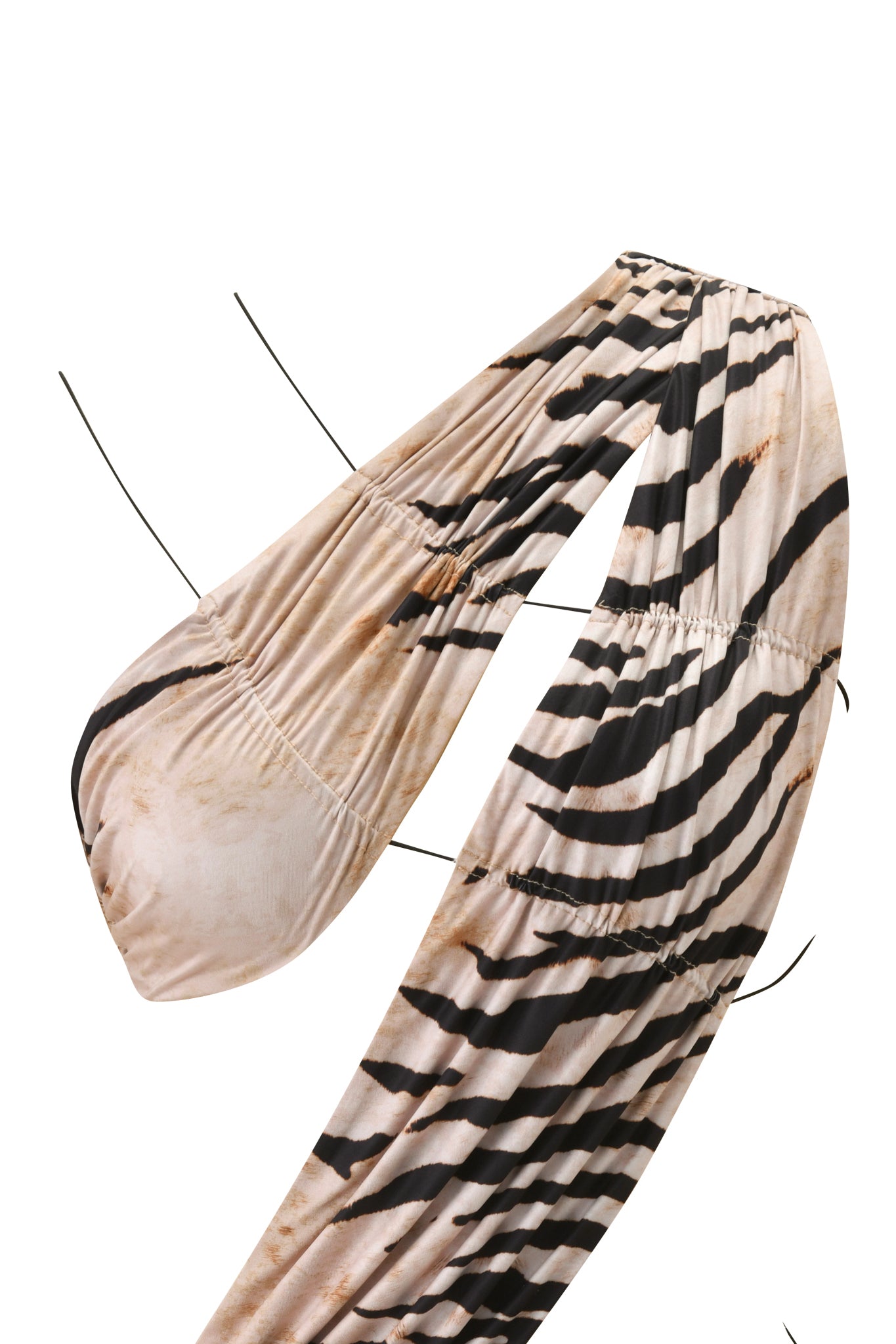 A close-up of a zebra-print bikini top with thin black ties and ruching, inspired by the bold I.AM.GIA SASKIA MINI DRESS - WILD SIDE.