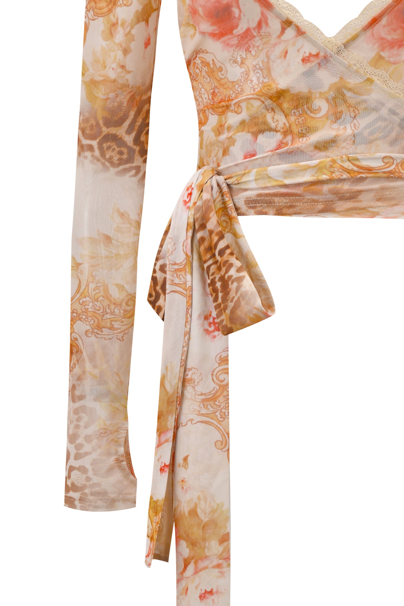 A close-up of the I.AM.GIA ERISKA TOP - DESERT ROSE shows its mesh fabric with floral and animal prints in beige, brown, and peach, featuring a tied waist detail and scalloped lace trim on the left sleeve.