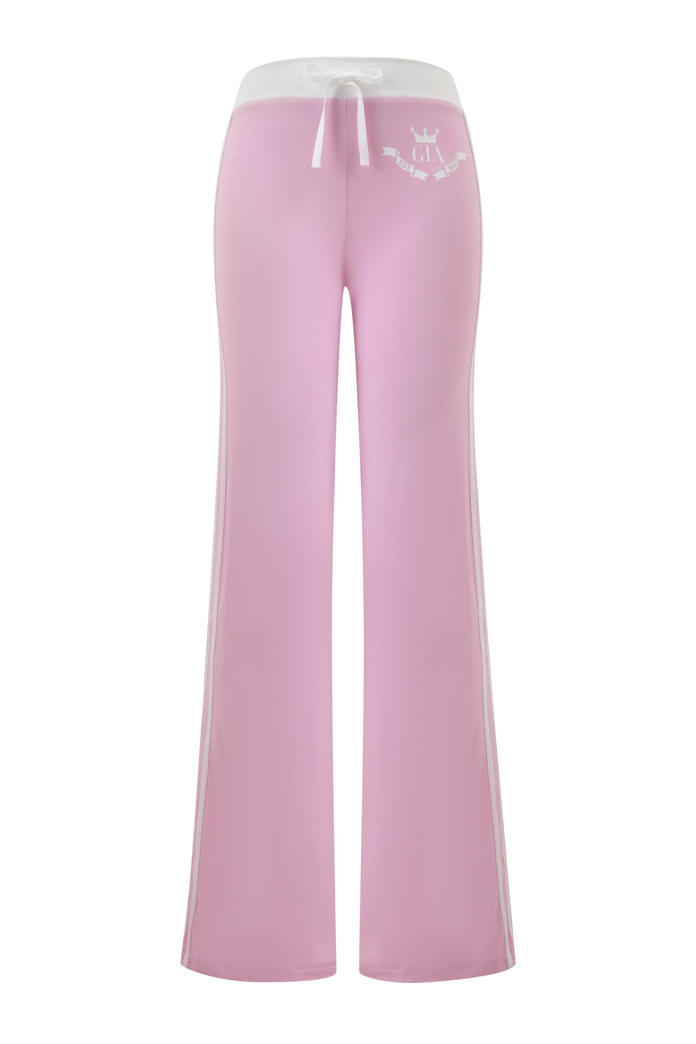 The BLARE PIPING TRACKPANT by I.AM.GIA in baby pink and white features a sporty straight-leg fit, soft viscose, contrast waistband and side stripe, plus a small crown graphic with text on the left hip. Shown from the back.