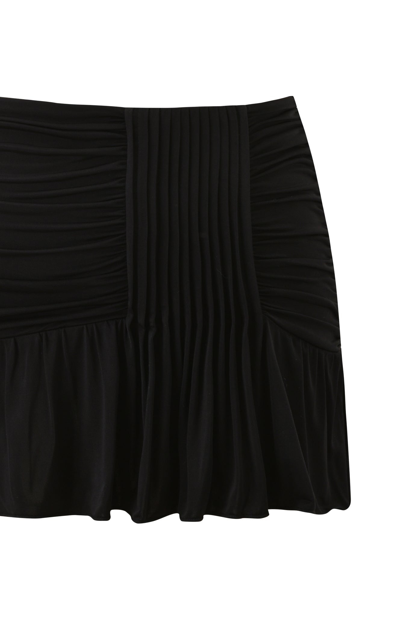 The ELYSIA MINI SKIRT - BLACK by I.AM.GIA is a black slinky knit mini skirt with gathered and pleated details, a fitted waistband, and a slightly flared hem, shown against a white background.