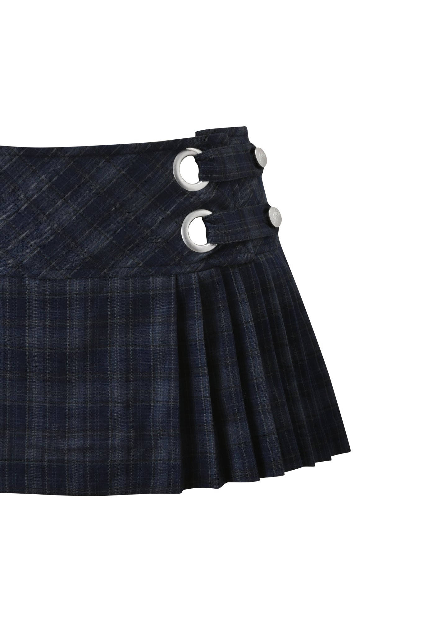 The I.AM.GIA ROUX MINI SKORT in blue plaid features pleats, two silver grommets, and buttons on the low-rise waist, shown in a close-up against a white background.