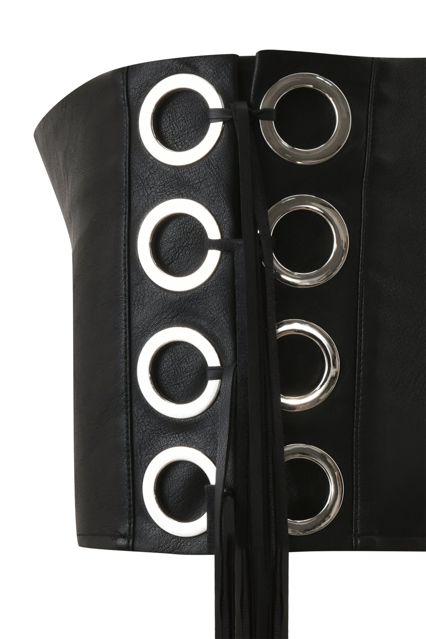 Close-up of a black leather corset with silver grommets and black lacing, paired with I.AM.GIA’s NURI FRINGE SHORT - BLACK faux-leather shorts for a sleek, mid-rise look.