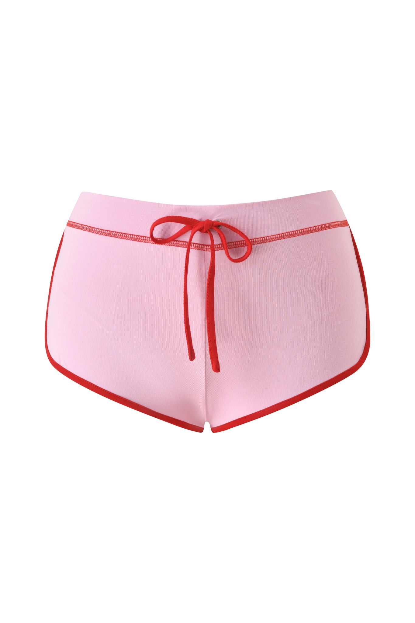 The I.AM.GIA BLARE DOLPHIN SHORT in baby pink features mini pink shorts with red trim and a matching red drawstring, showcased against a plain white background.