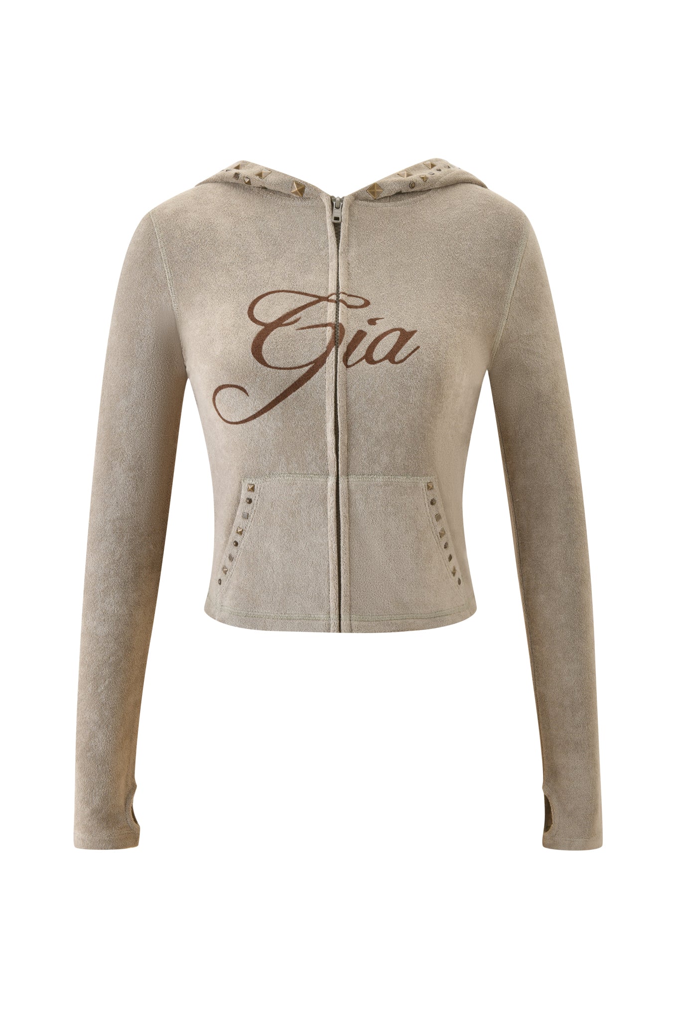 The I.AM.GIA BLARE STUDDED TERRY HOODIE in Stone is a light brown zip-up hoodie with a hood, front pockets, "Gia" script on the chest, and subtle stud accents for an elevated look.